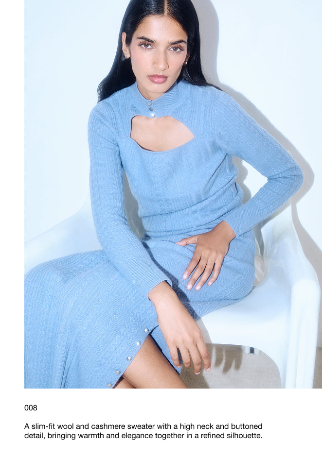 CABLE KNIT SWEATER WITH CUT-OUT