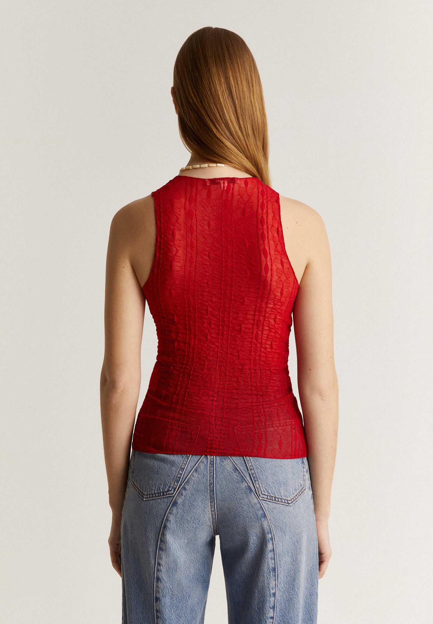 TEXTURED CROSSOVER TOP