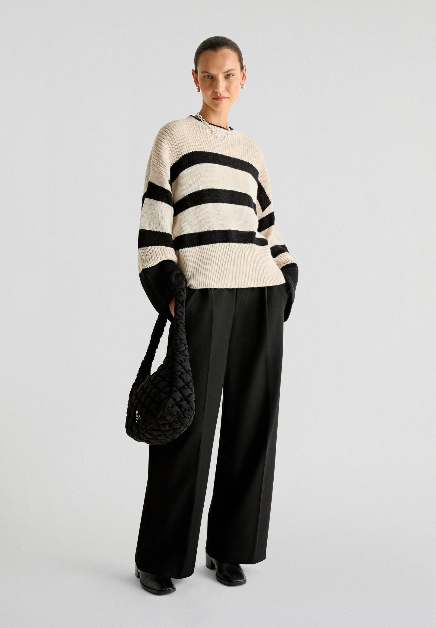 STRIPED SWEATER WITH FLARED SLEEVES