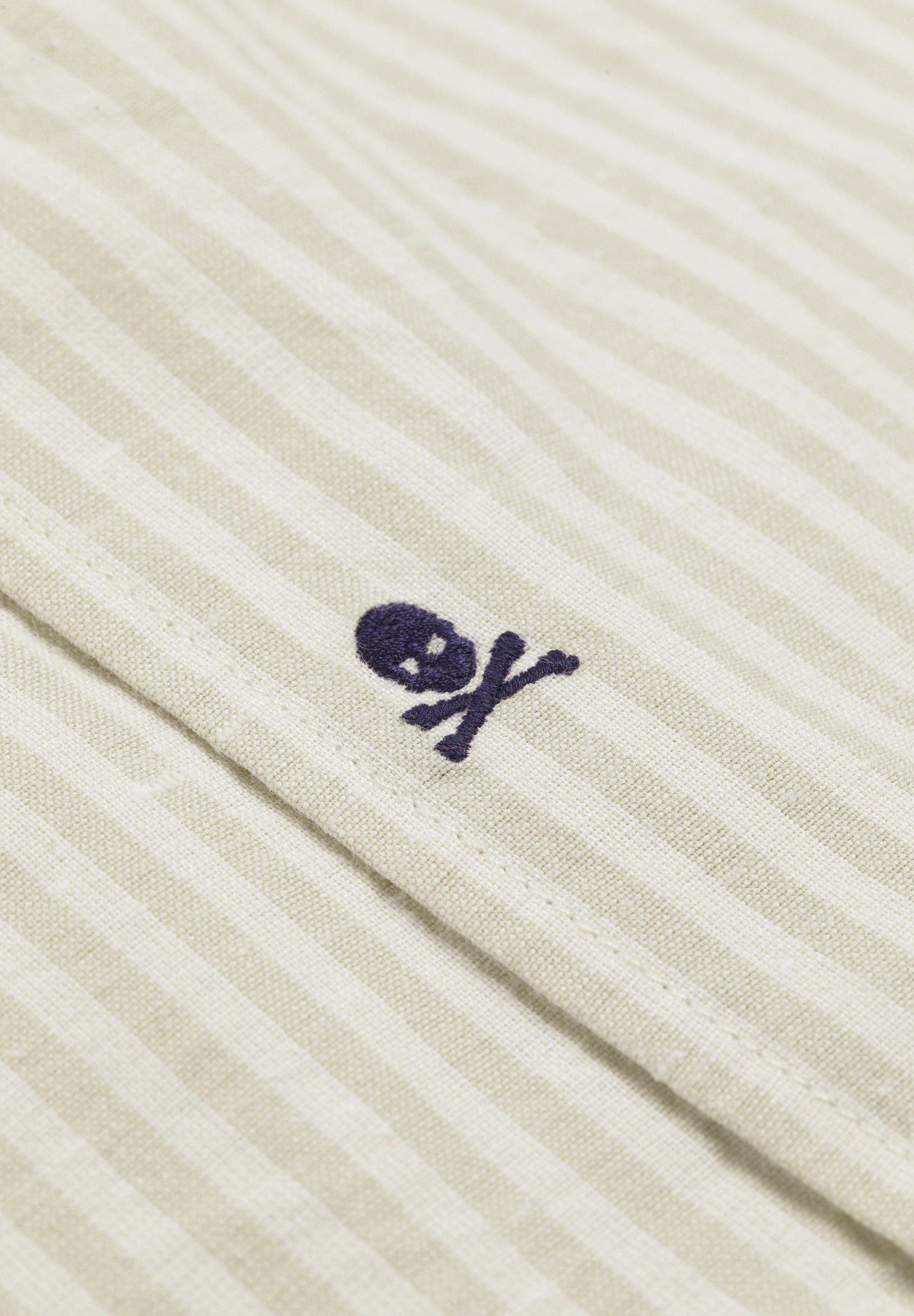 STRIPED SHIRT WITH SKULL AND PLACKET