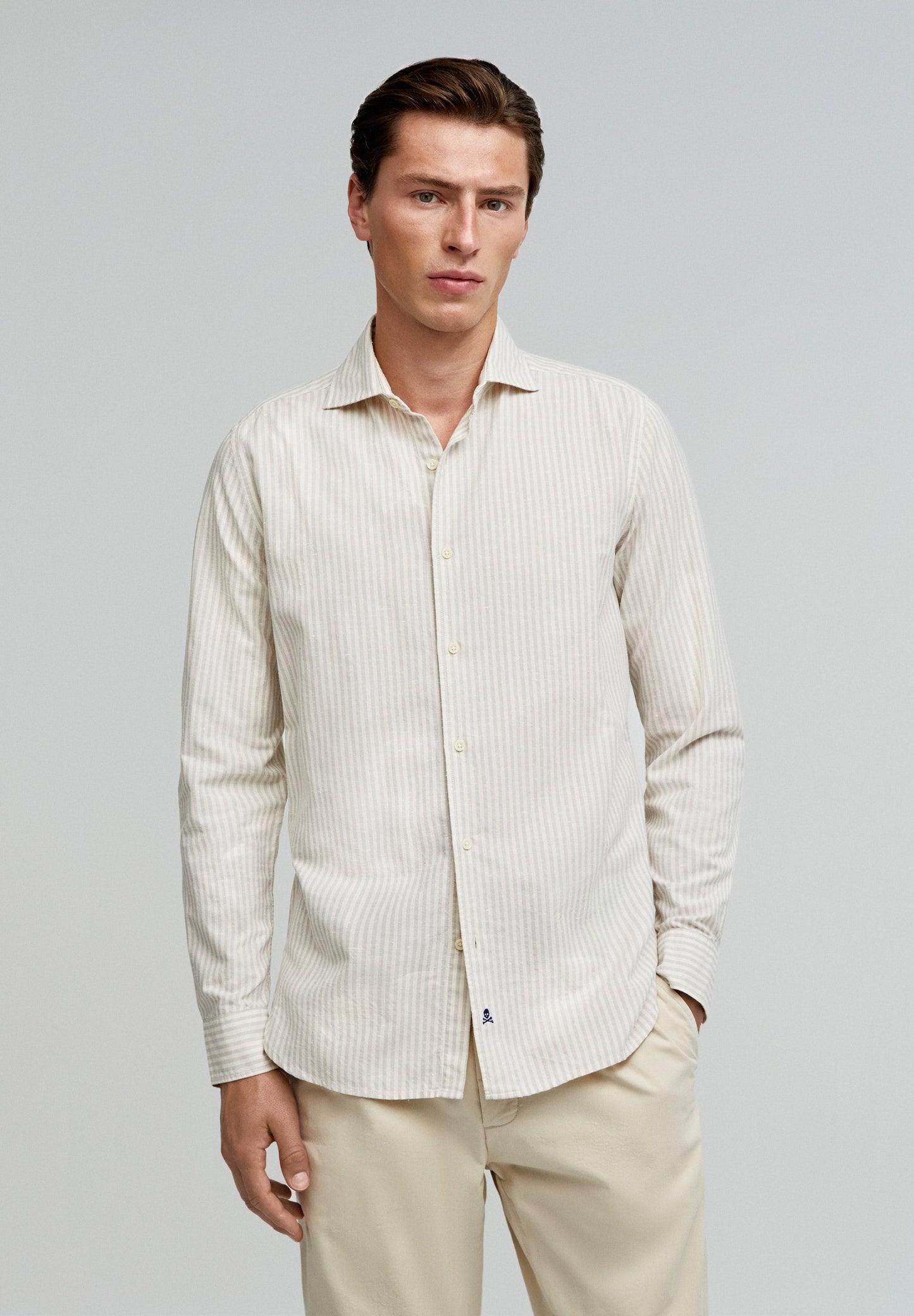 STRIPED SHIRT WITH SKULL AND PLACKET