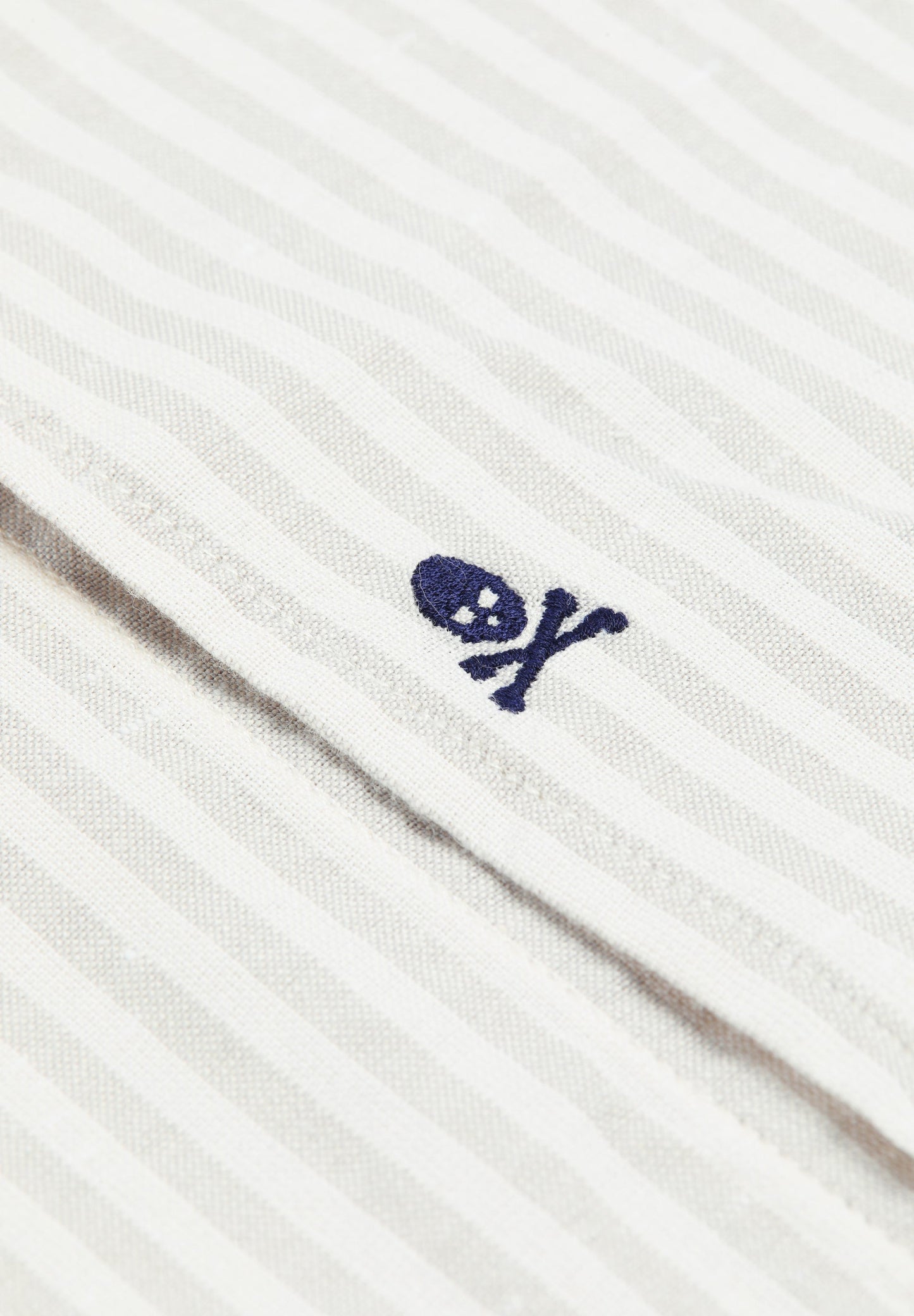 STRIPED SHIRT WITH SKULL AND PLACKET