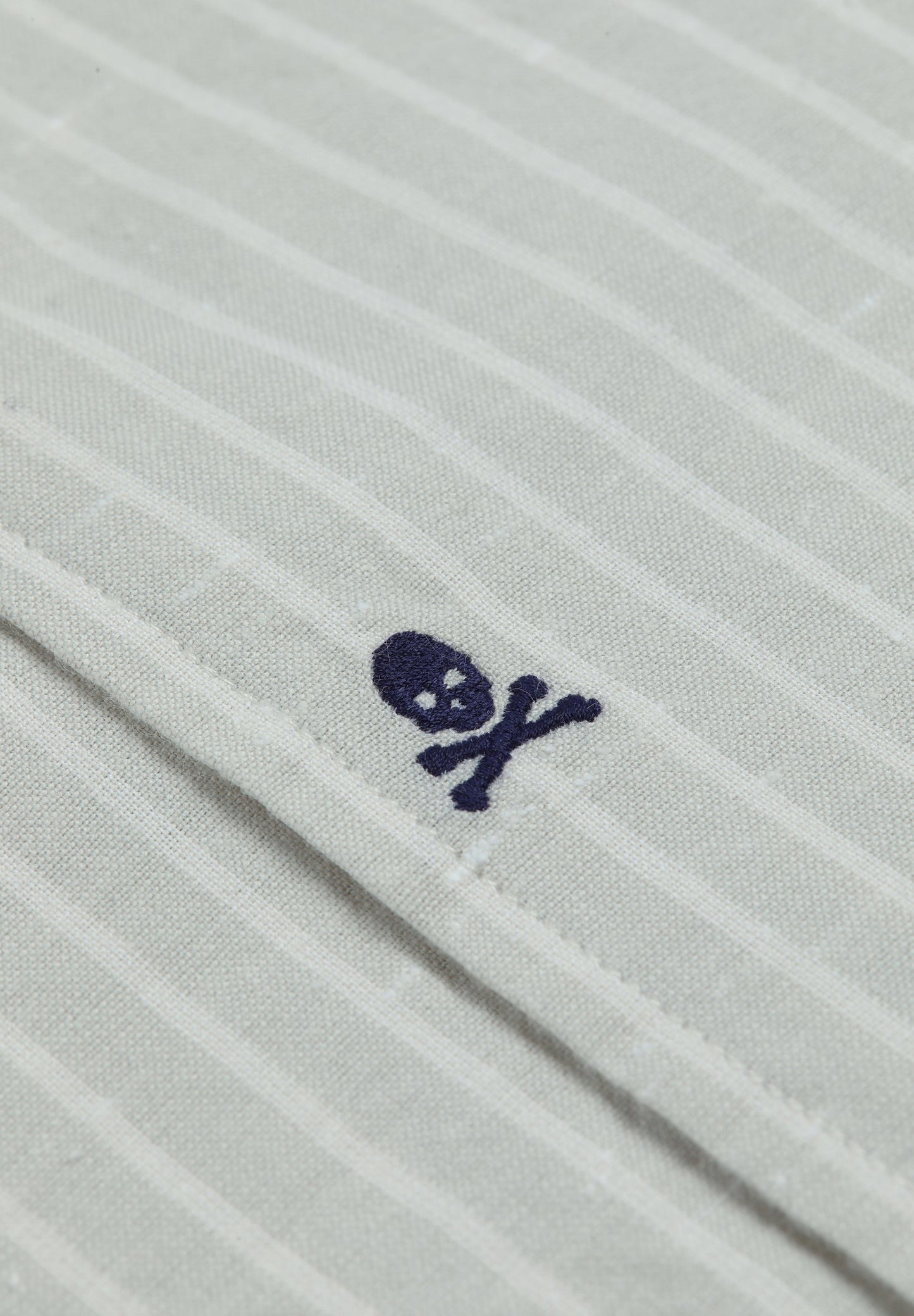 STRIPED SHIRT WITH SKULL AND PLACKET