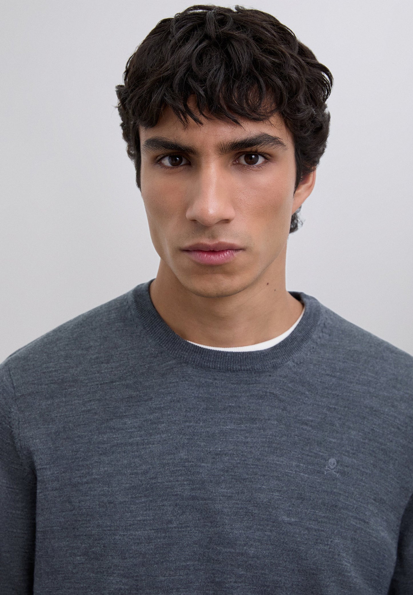 WOOL SWEATER WITH EMBROIDERED SKULL