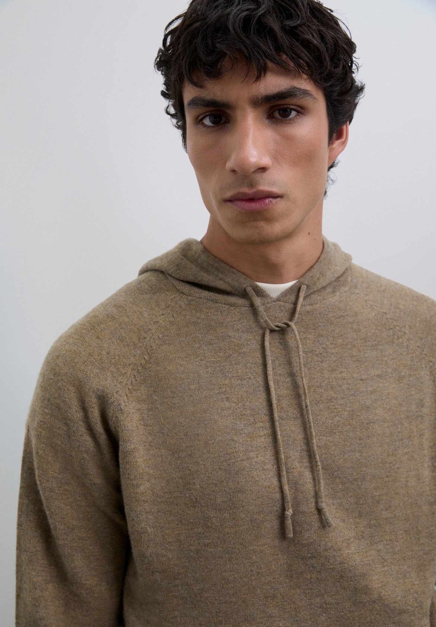 WOOL SWEATER WITH ADJUSTABLE HOOD