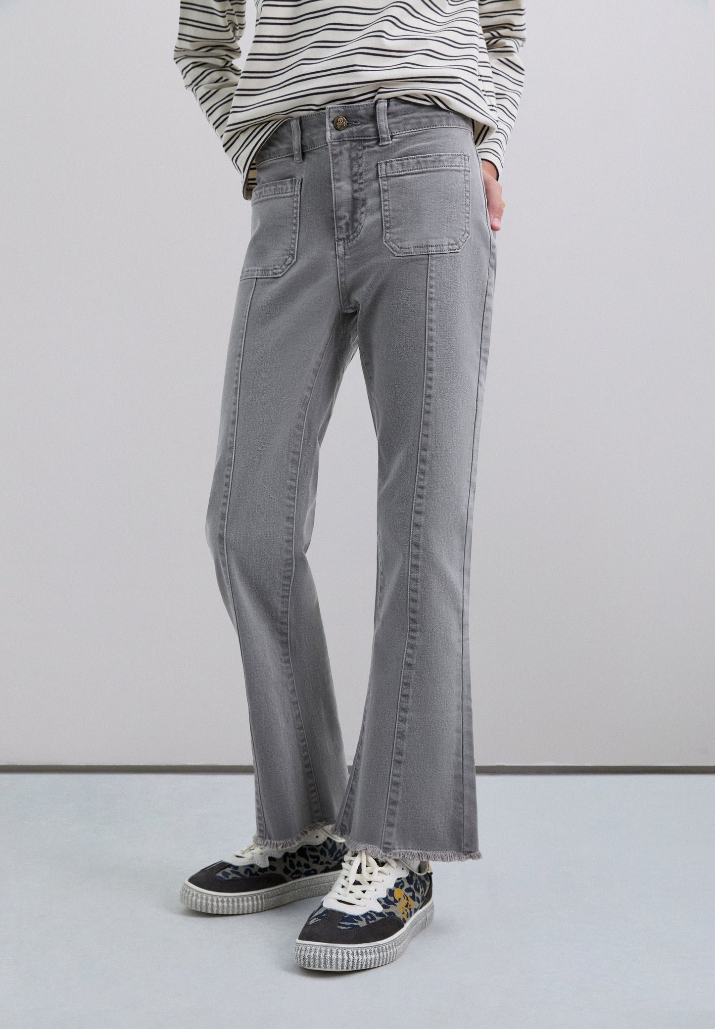FLARED TROUSERS WITH FRINGING