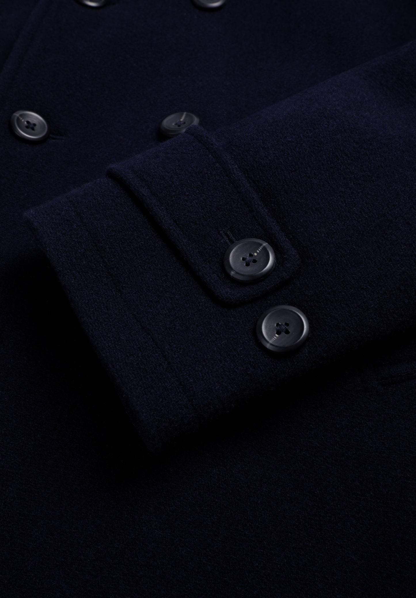 DOUBLE-BREASTED WOLLEN JAS MET KNOPEN