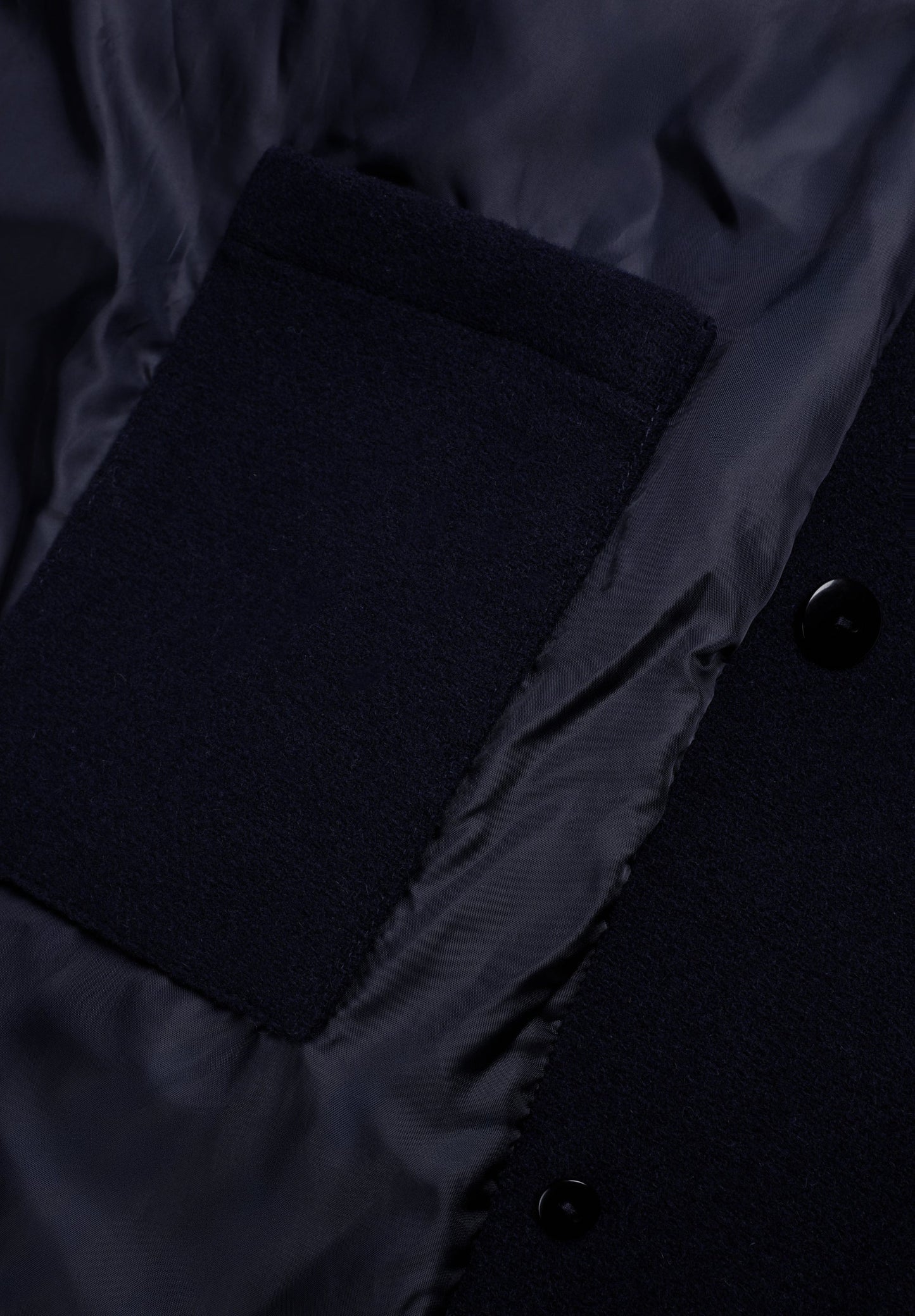 DOUBLE-BREASTED WOLLEN JAS MET KNOPEN