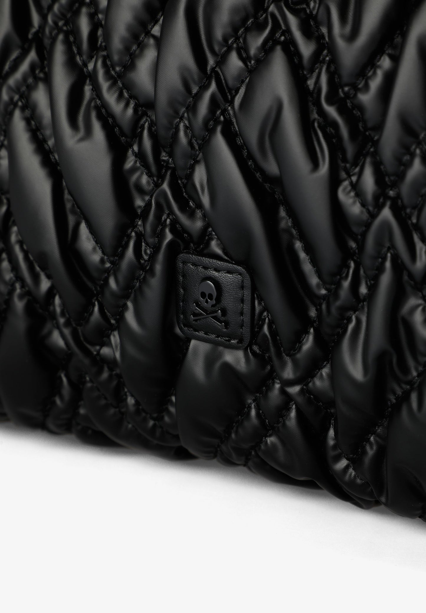 QUILTED SKULL TOTE BAG