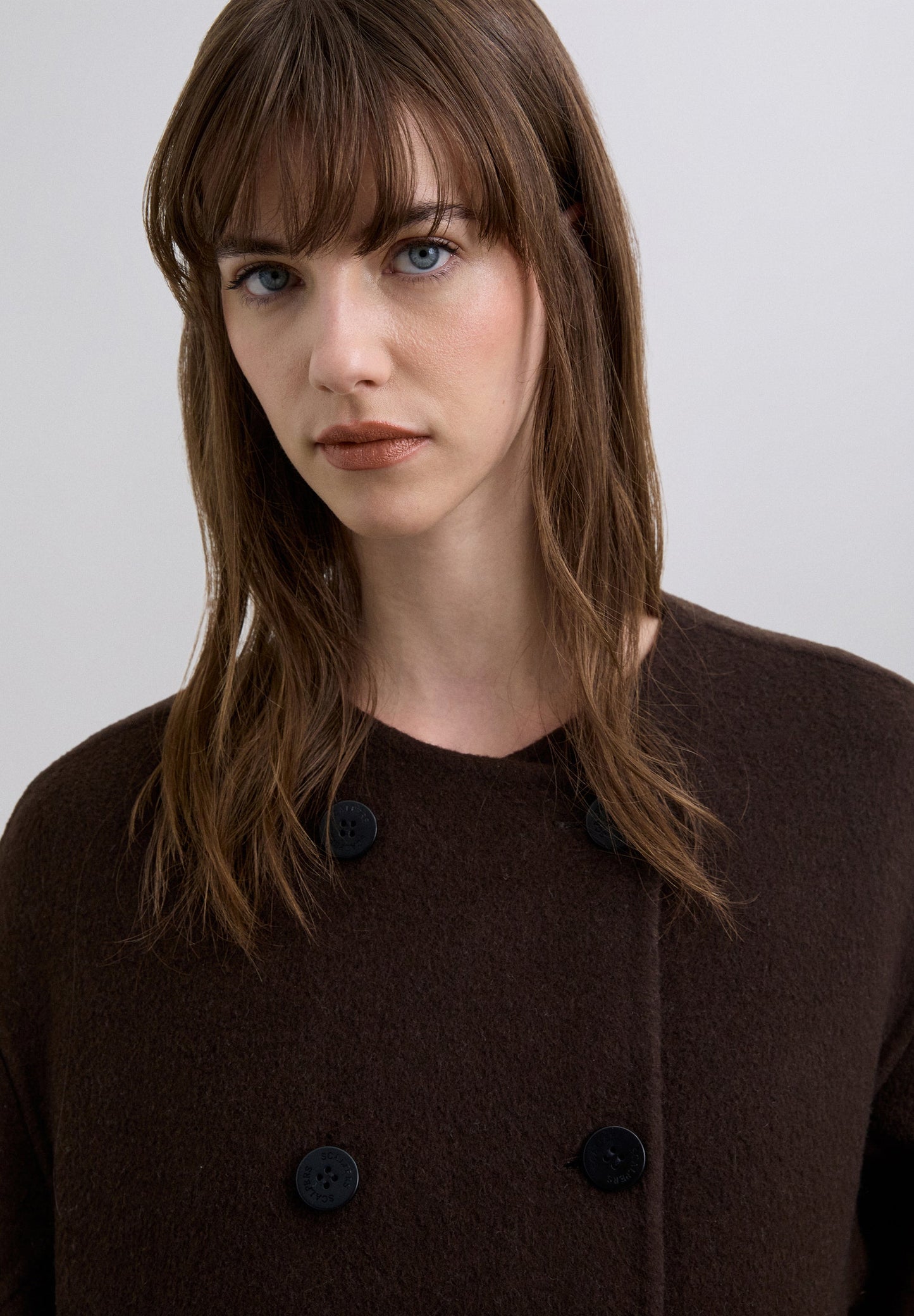 TWEEZIJDIGE JAS VAN WOLMIX