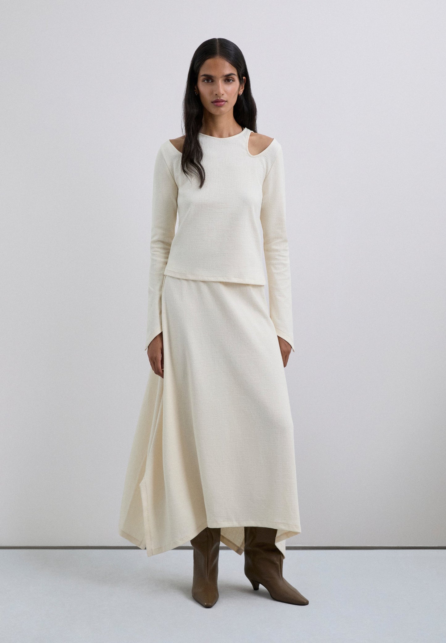 ASYMMETRIC KNIT MIDI SKIRT