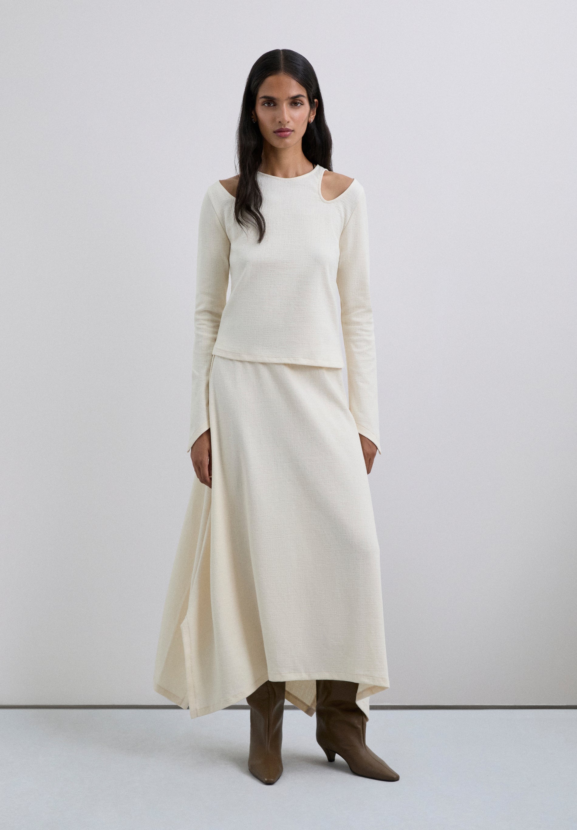 ASYMMETRIC KNIT MIDI SKIRT