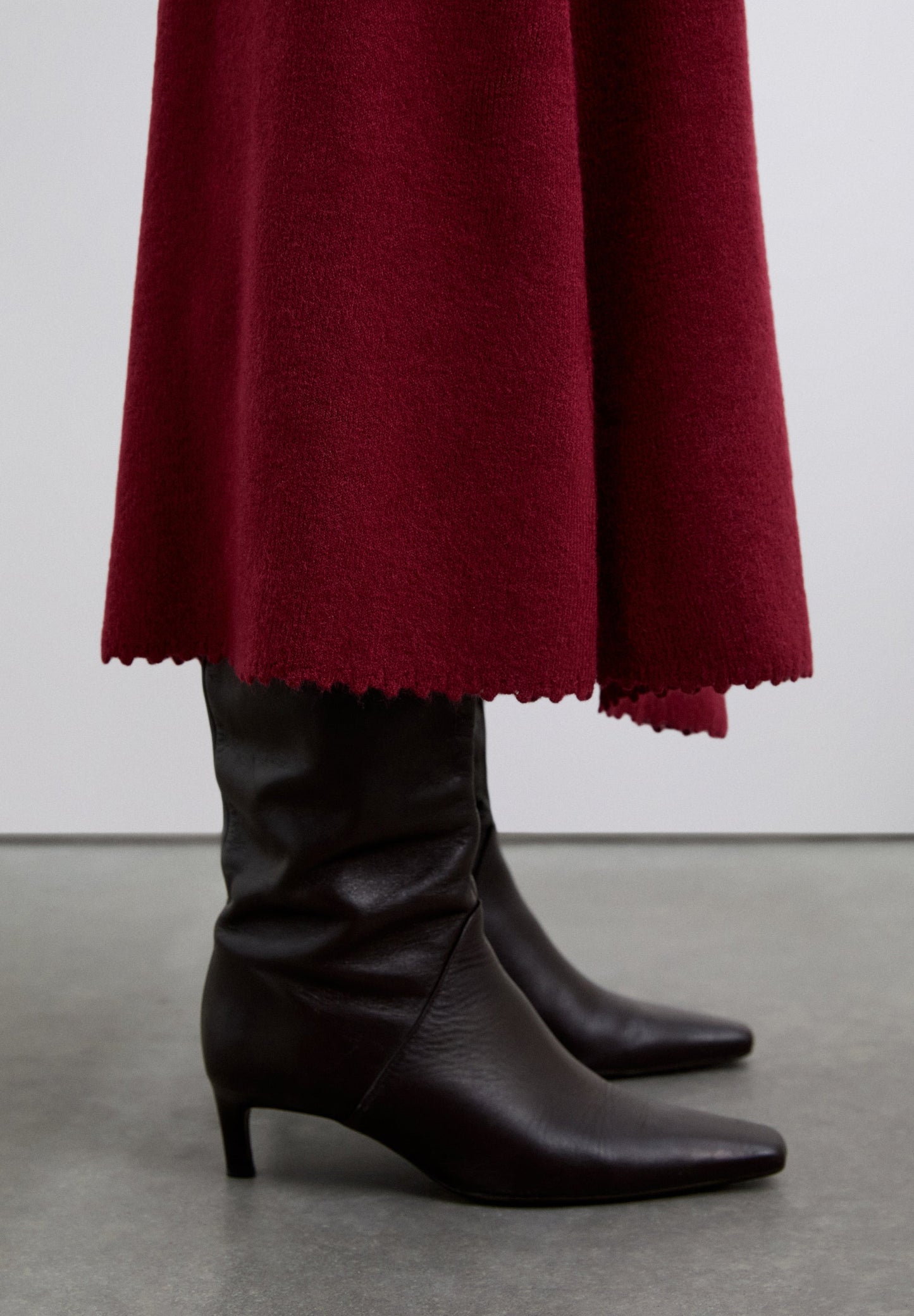 SPECIAL FINISH ASYMMETRIC SKIRT