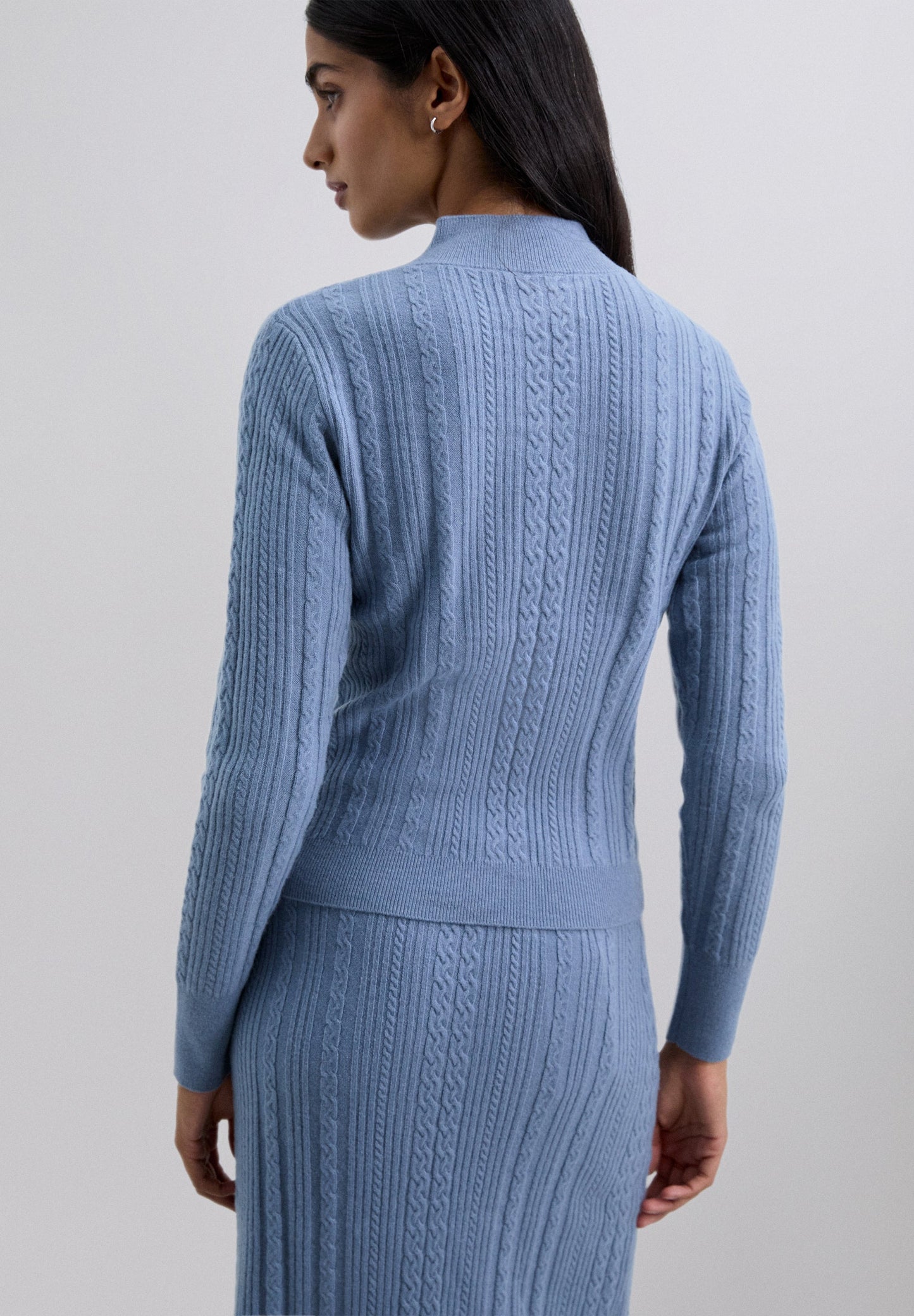 CABLE KNIT SWEATER WITH CUTOUT