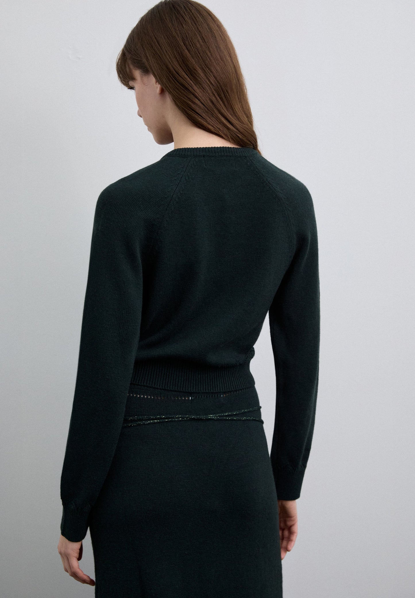 SWEATER WITH CUTOUTS AND TIE DETAIL