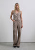 CHECKED FLARED TROUSERS