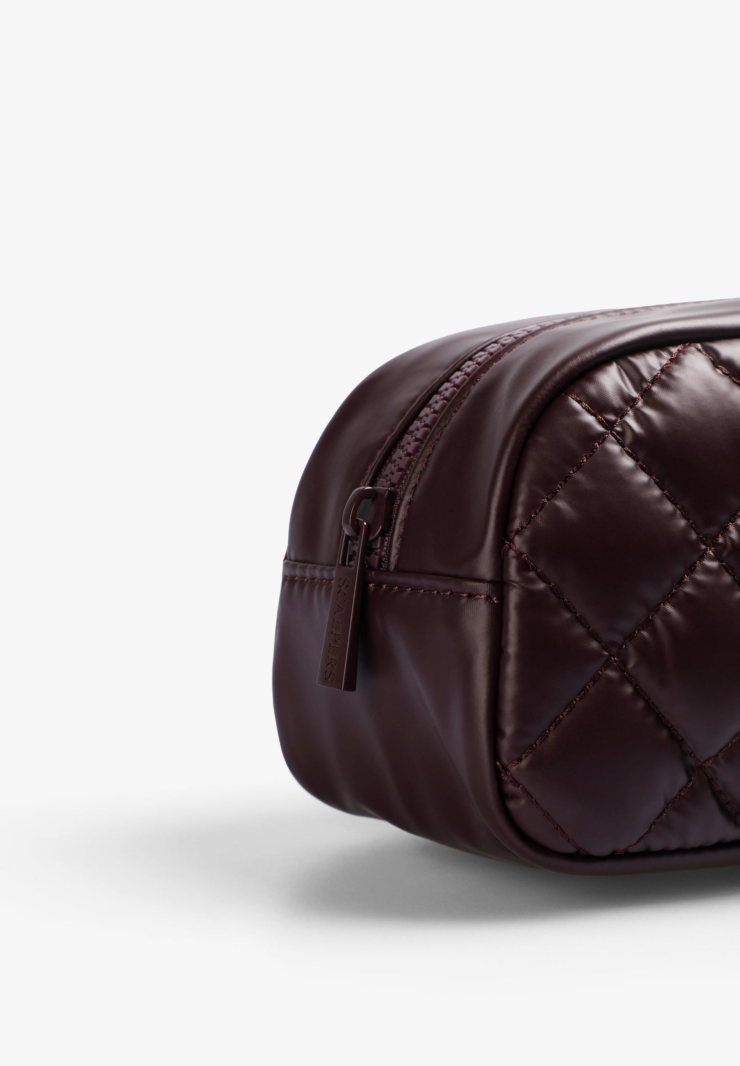 QUILTED TOILETRY BAG WITH SKULL