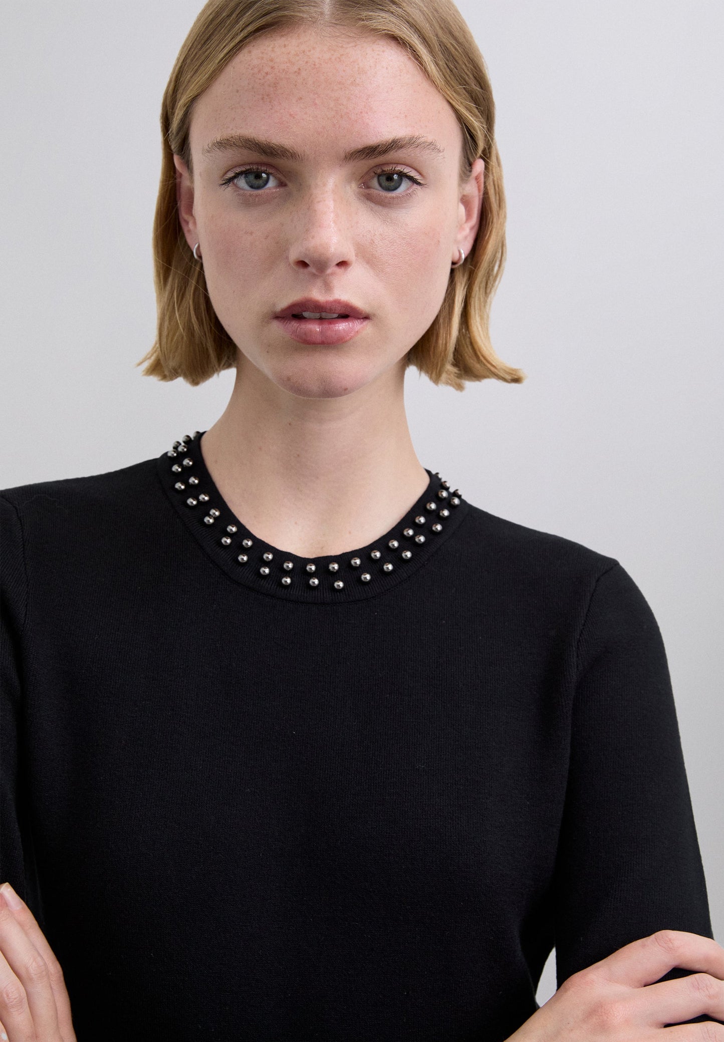 KNIT DRESS WITH STUDS AND SLIT