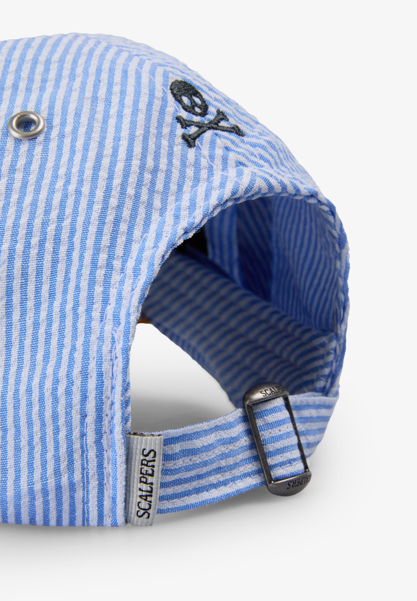 STRIPED CAP WITH EMBROIDERED DETAIL