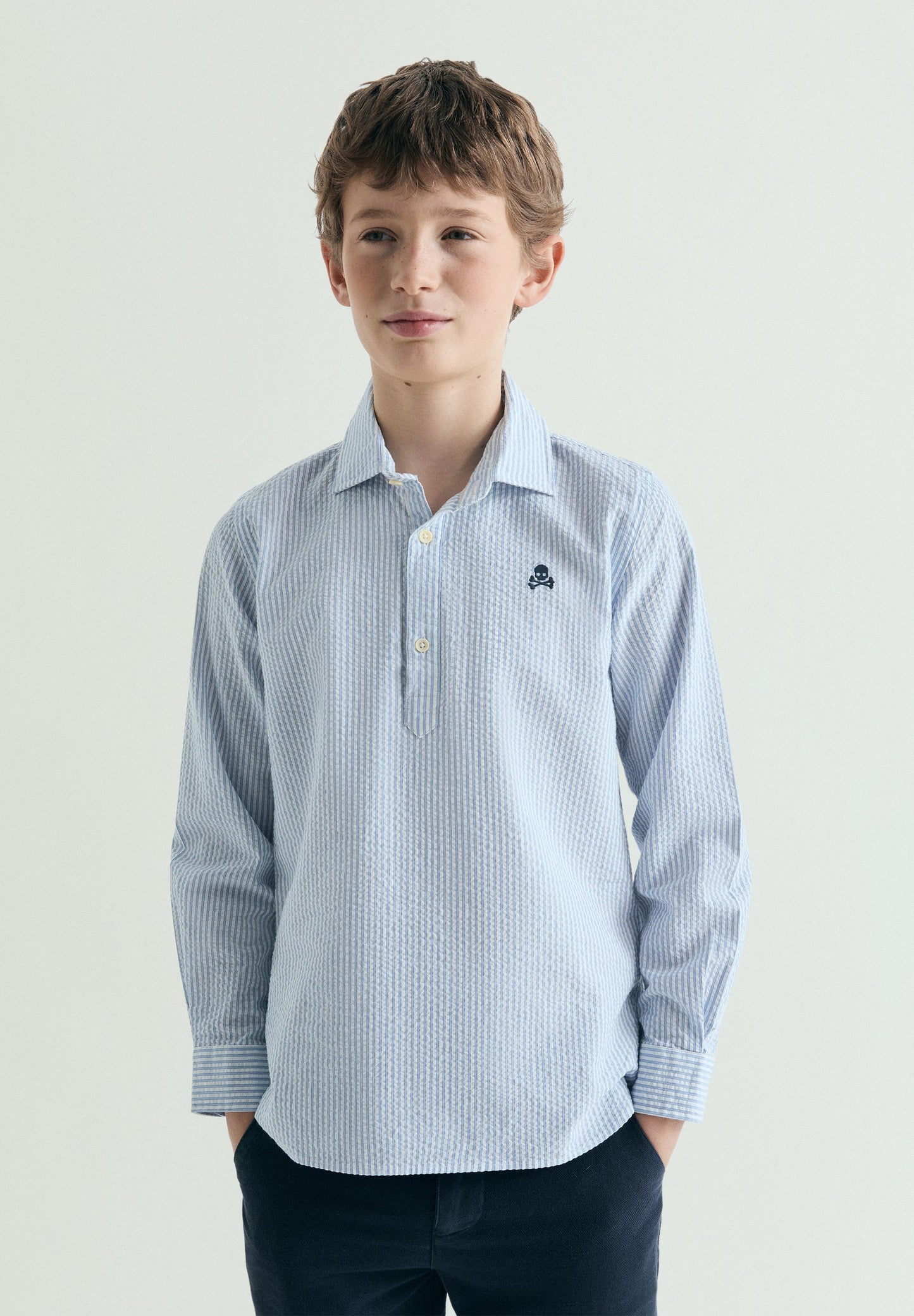 STRIPED POLO SHIRT WITH SKULL