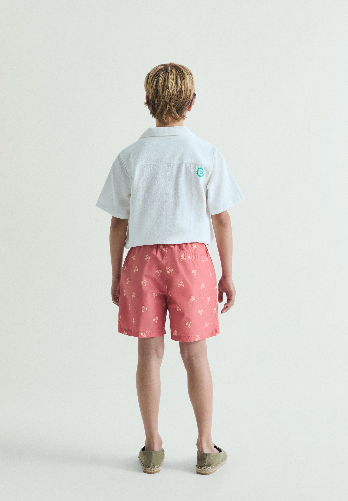 CONTRAST SKULL SWIMMING TRUNKS