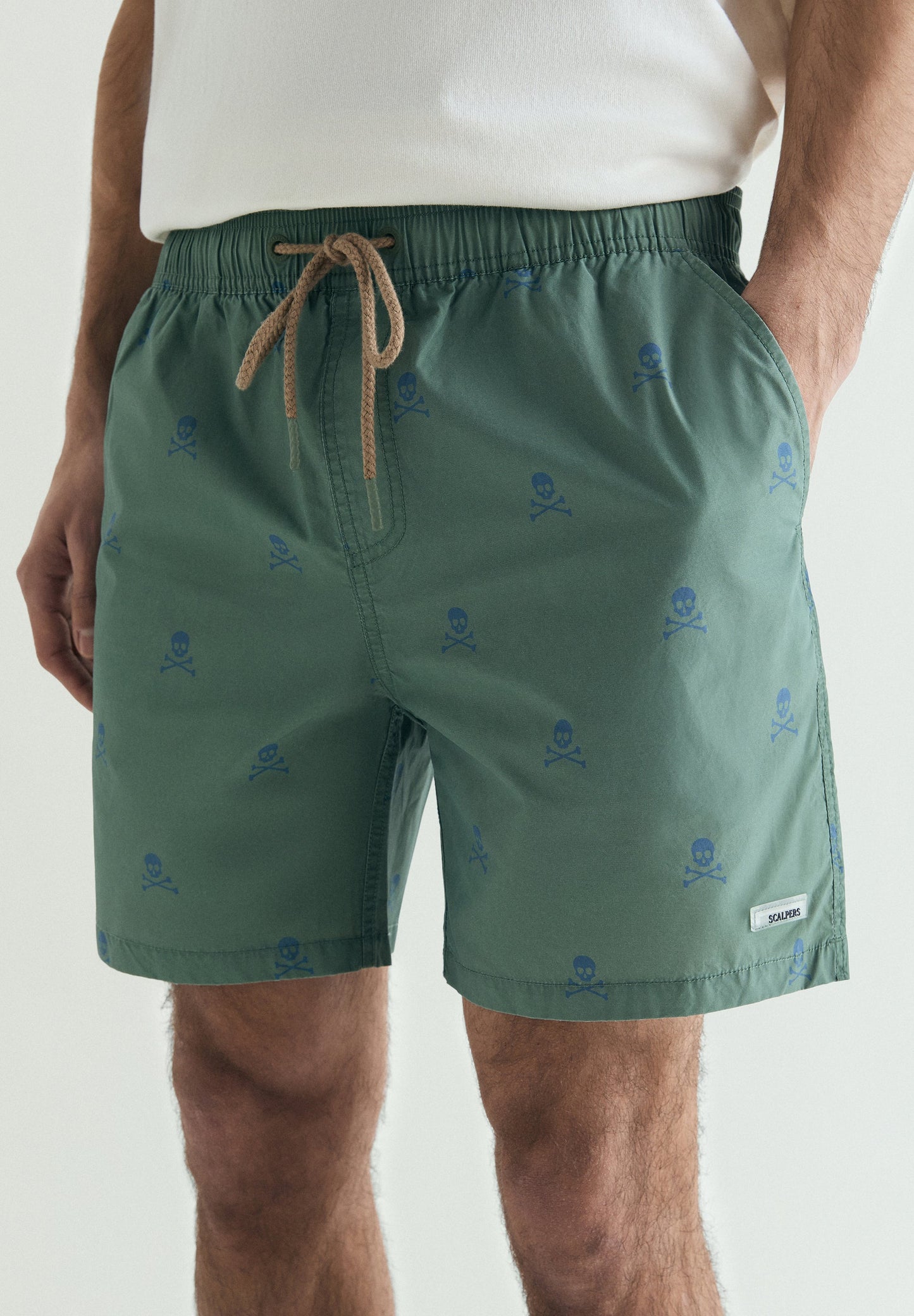 CONTRAST SKULL SWIMMING TRUNKS