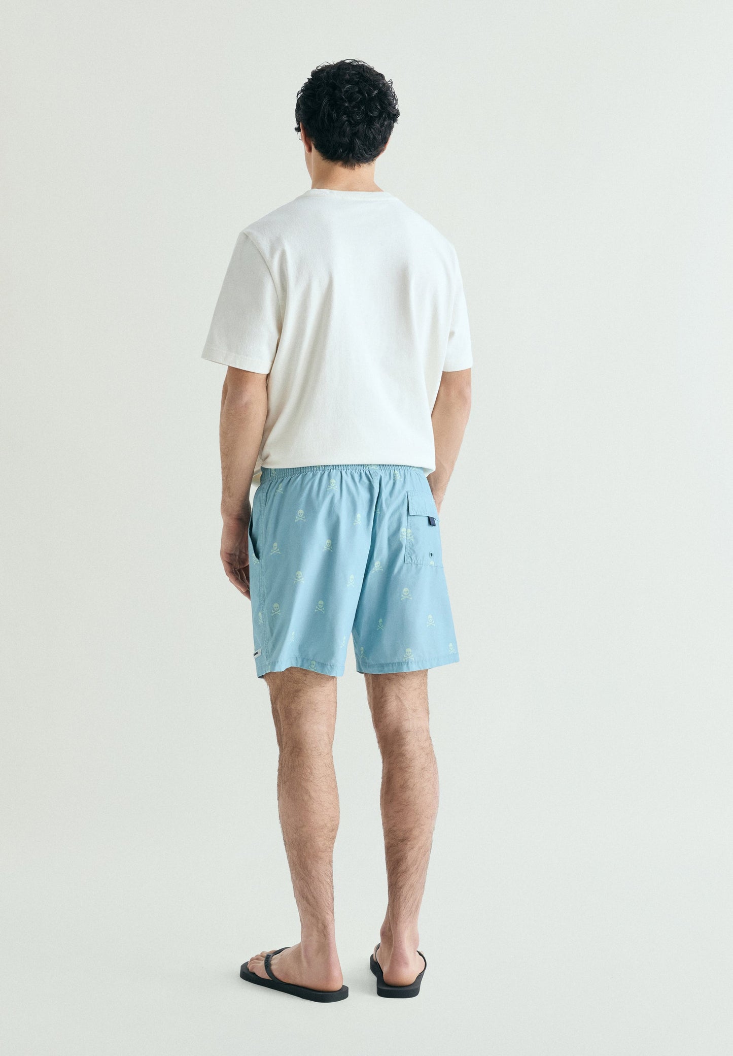 CONTRAST SKULL SWIMMING TRUNKS