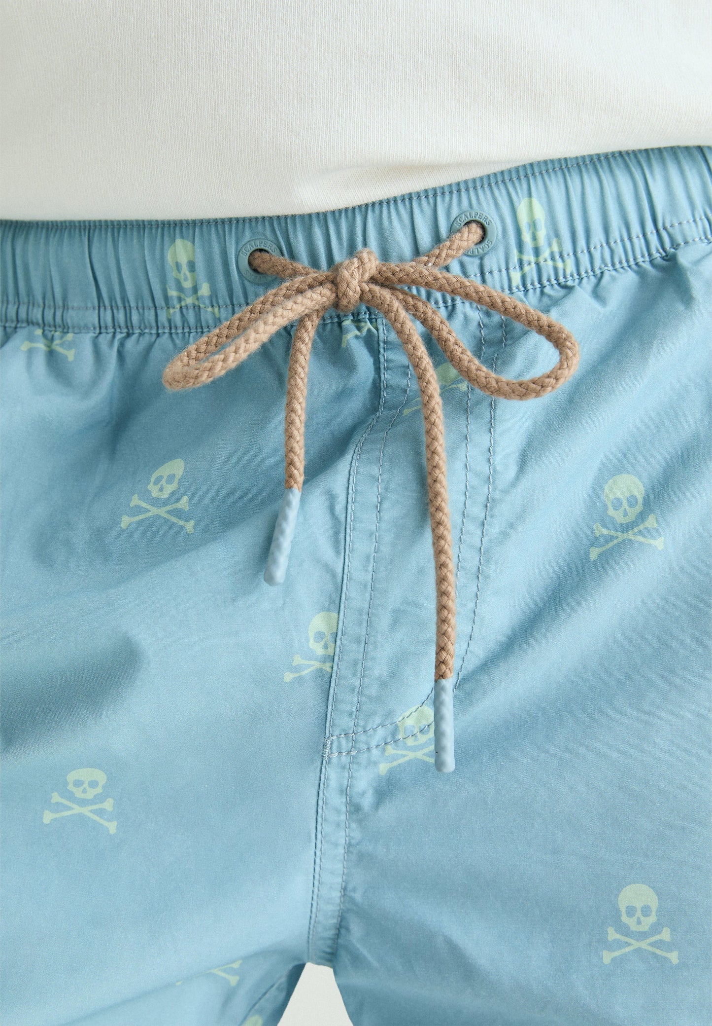 CONTRAST SKULL SWIMMING TRUNKS