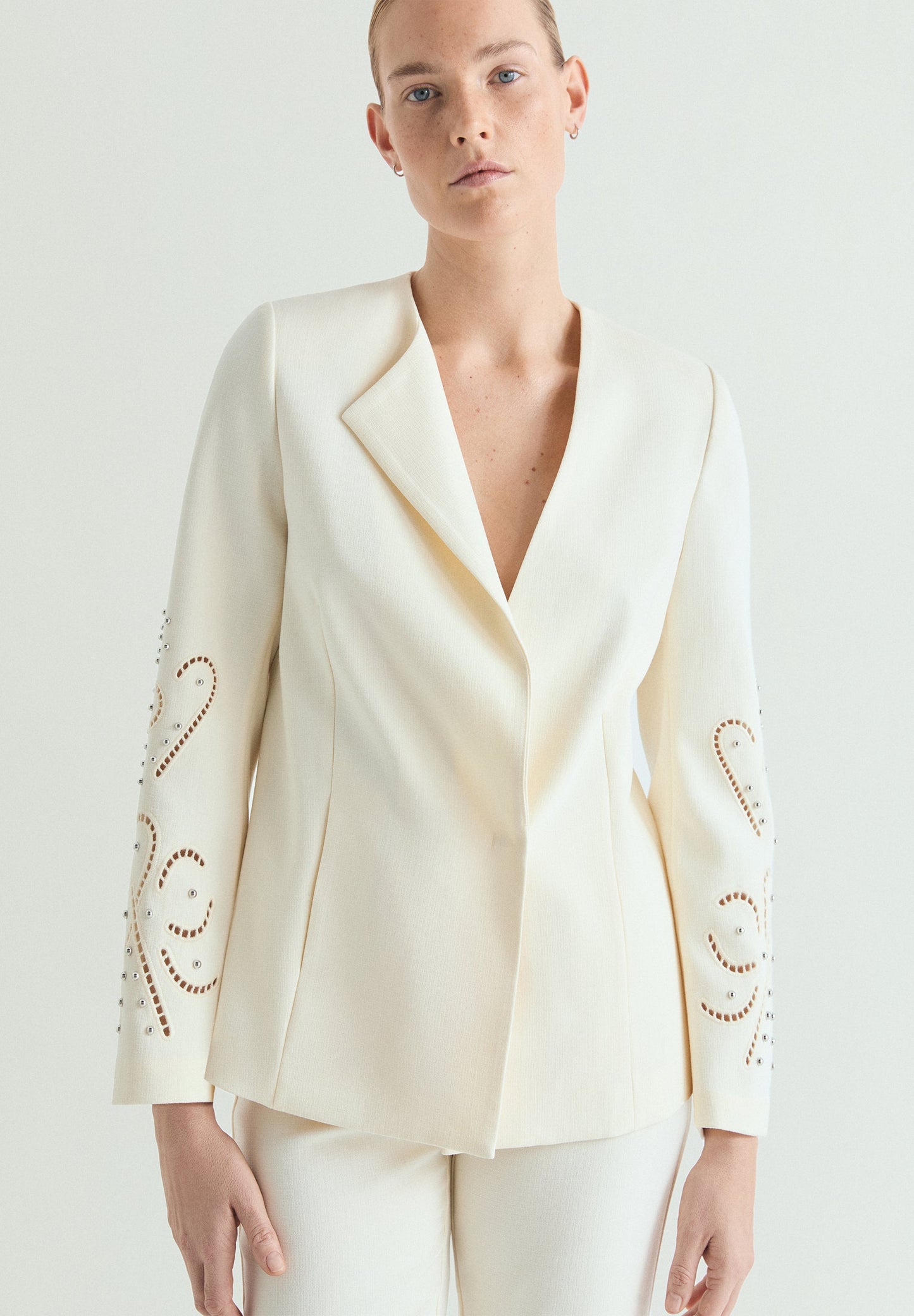 BLAZER WITH PERFORATED DETAILS