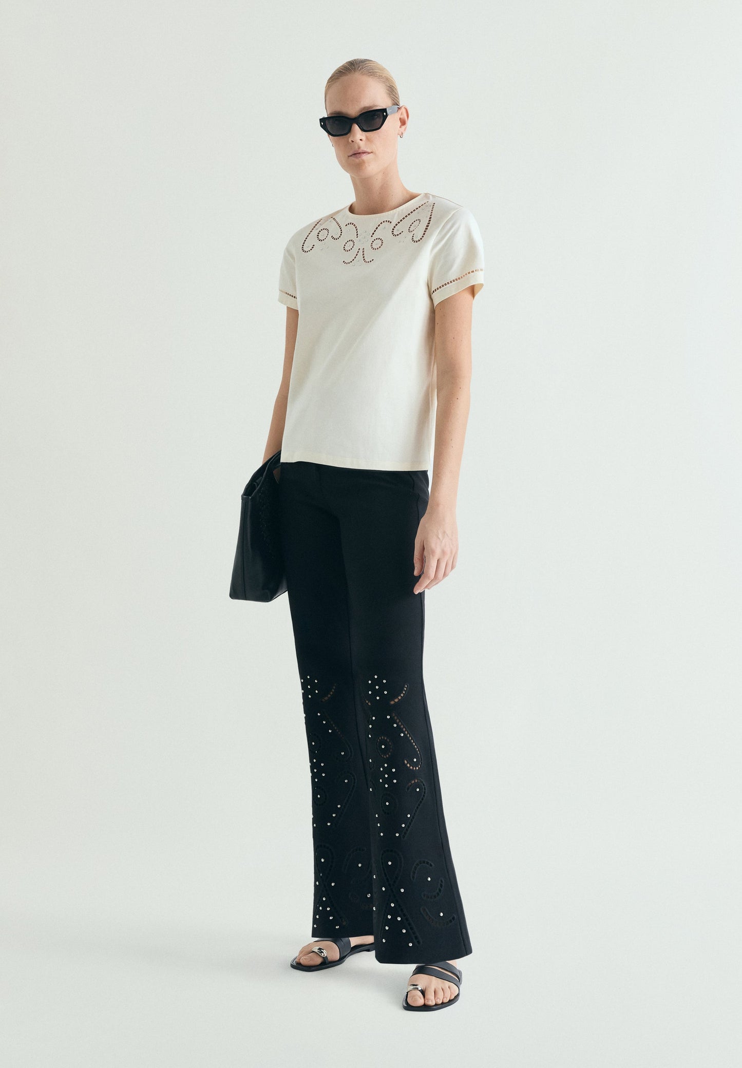T-SHIRT WITH DIE-CUT STUDDED DETAILS