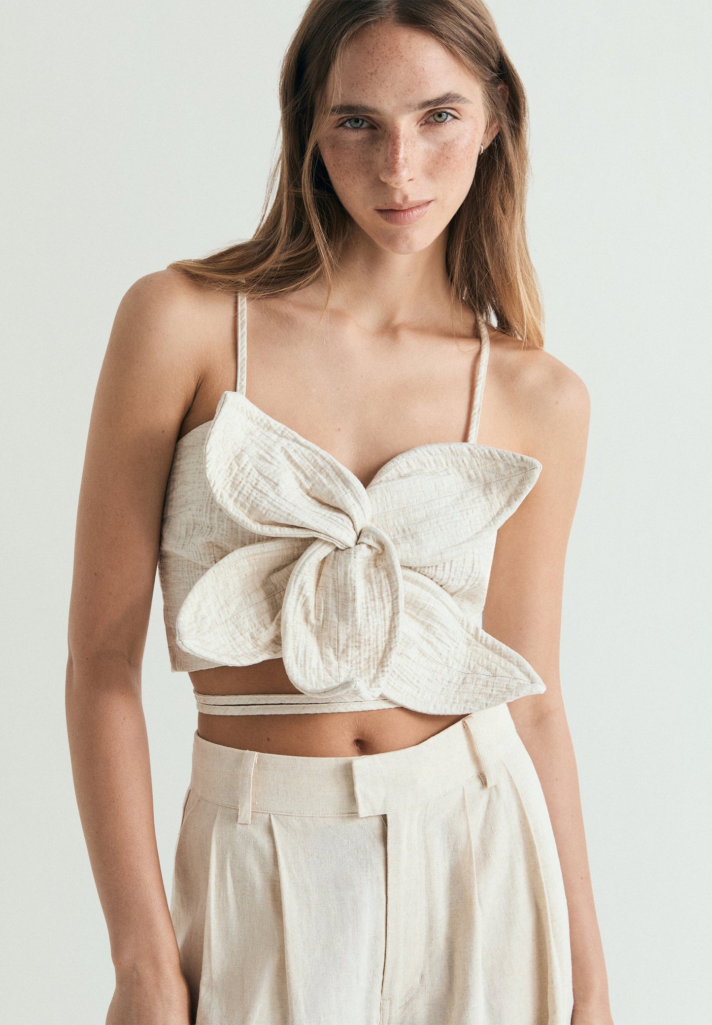 TOP WITH FLORAL DETAIL