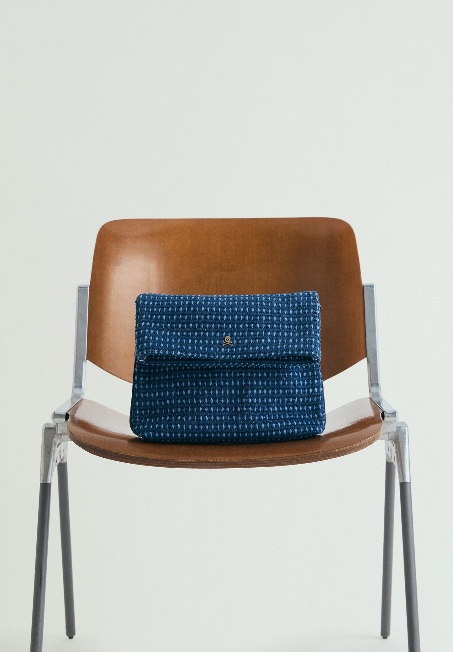 BRAIDED CLUTCH BAG