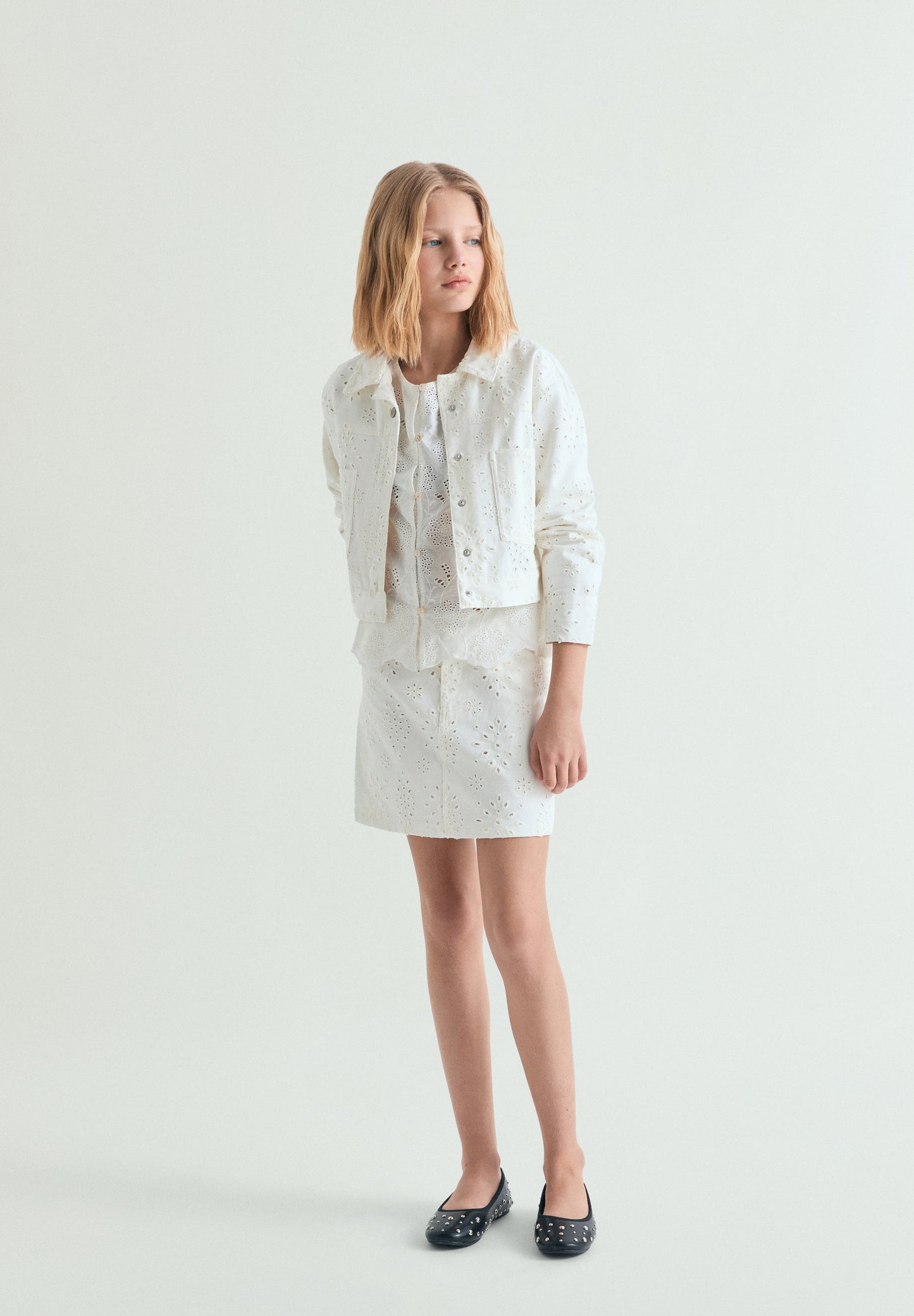 PERFORATED MINI SKIRT