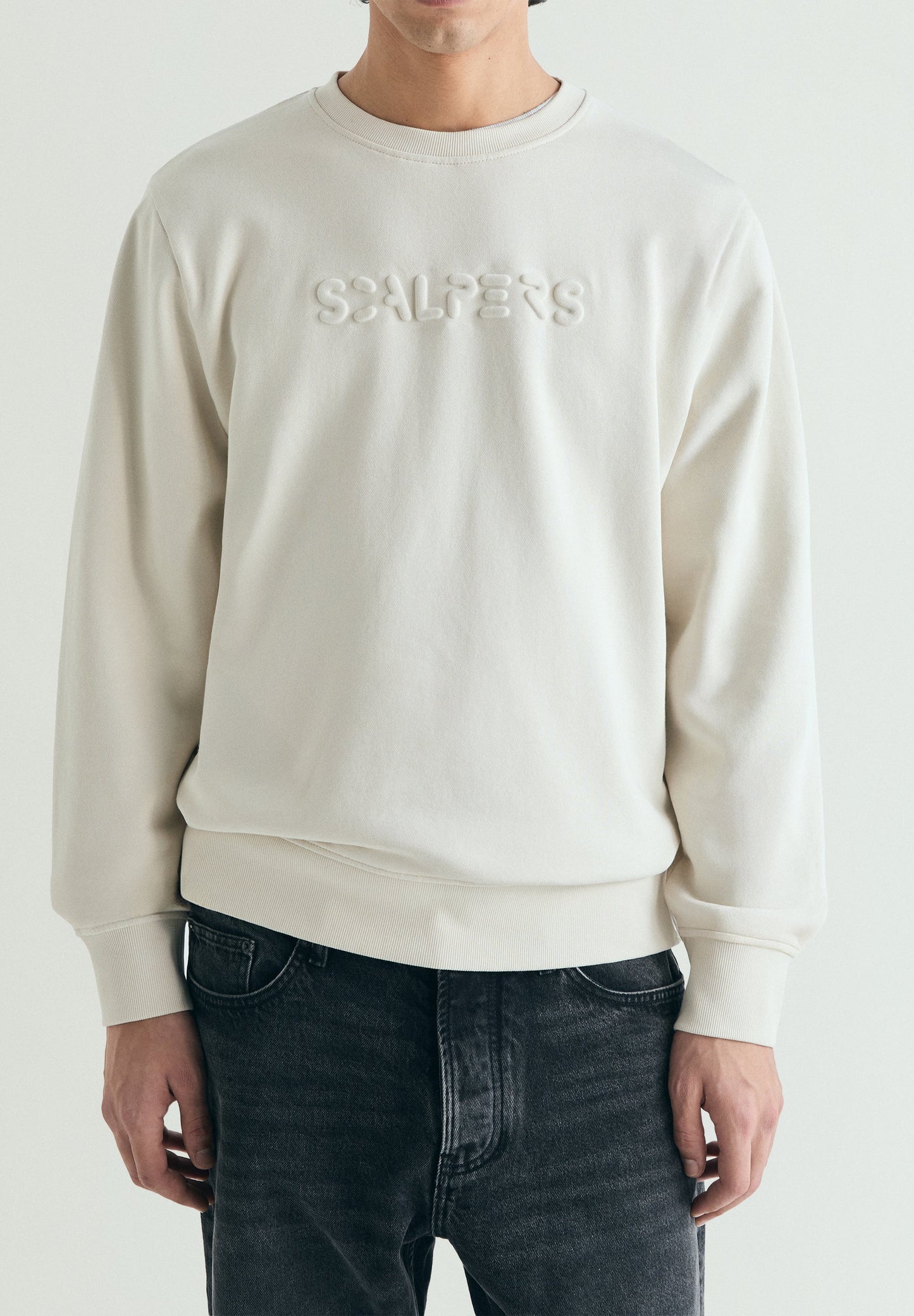 SWEATSHIRT WITH EMBOSSED SKULL