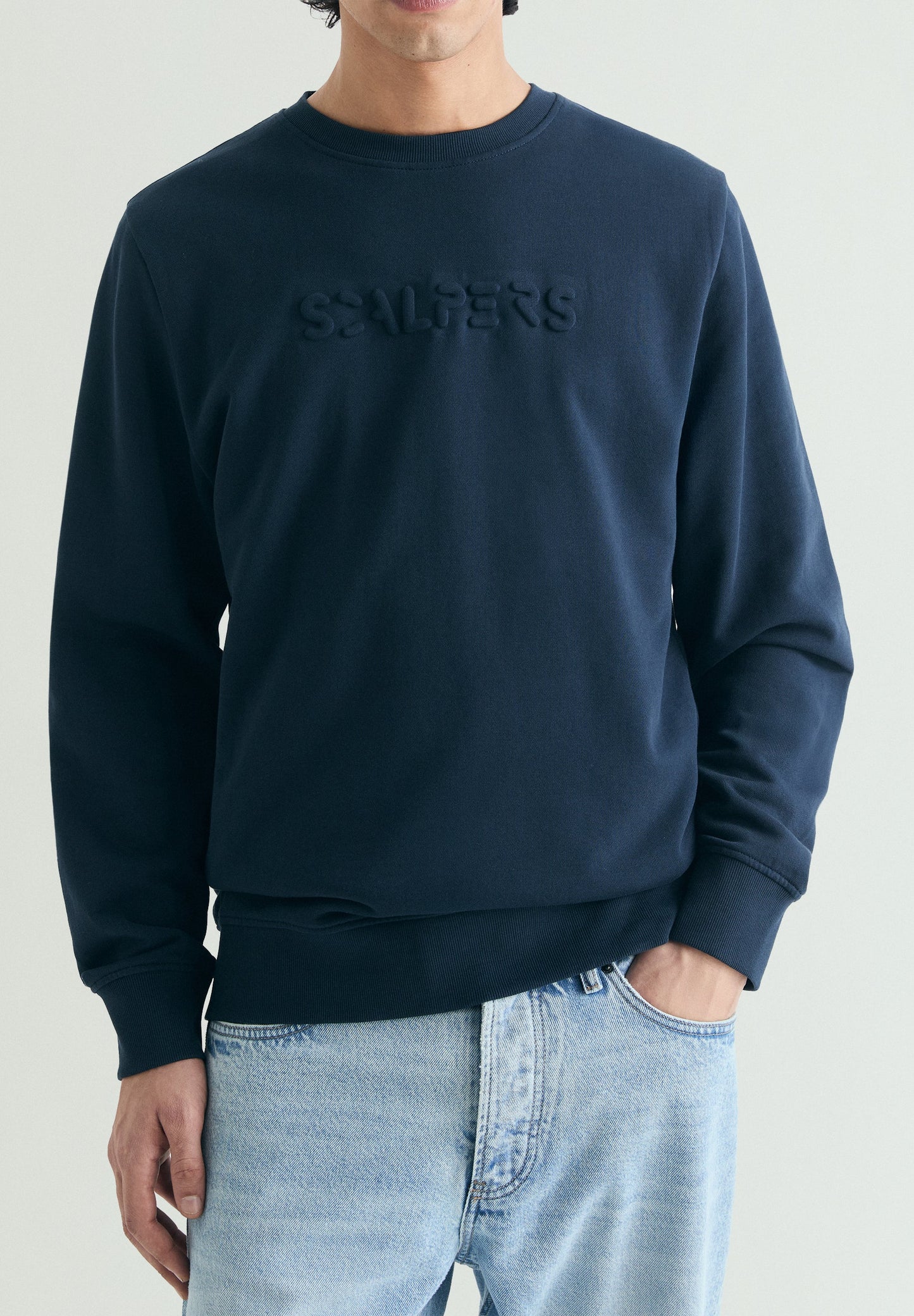 SWEATSHIRT WITH EMBOSSED SKULL