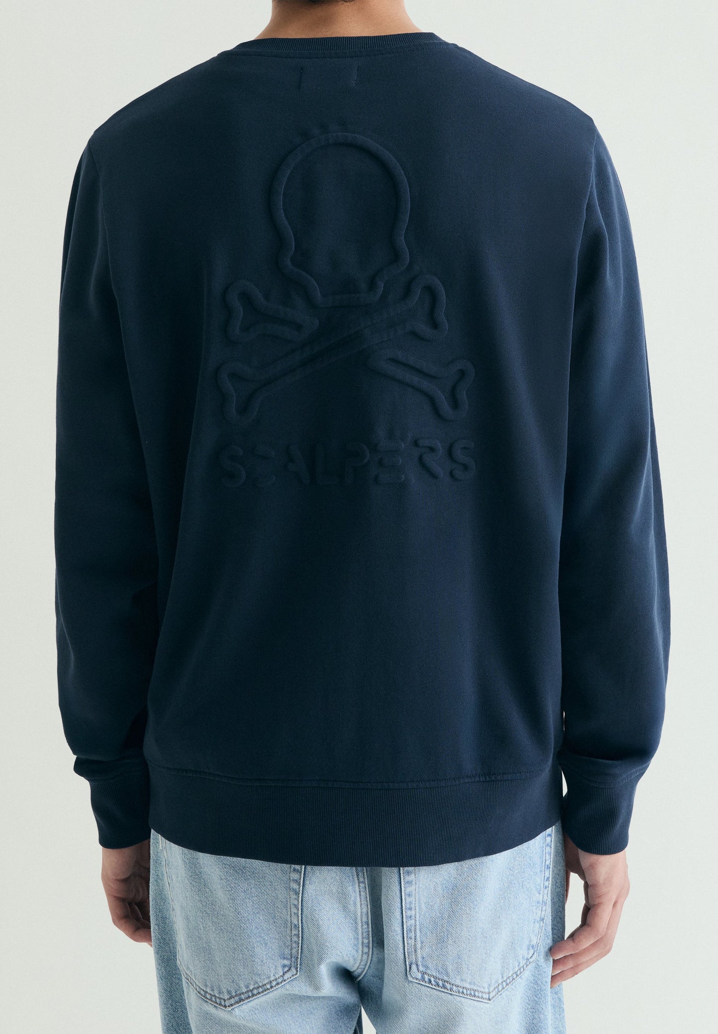 SWEATSHIRT WITH EMBOSSED SKULL