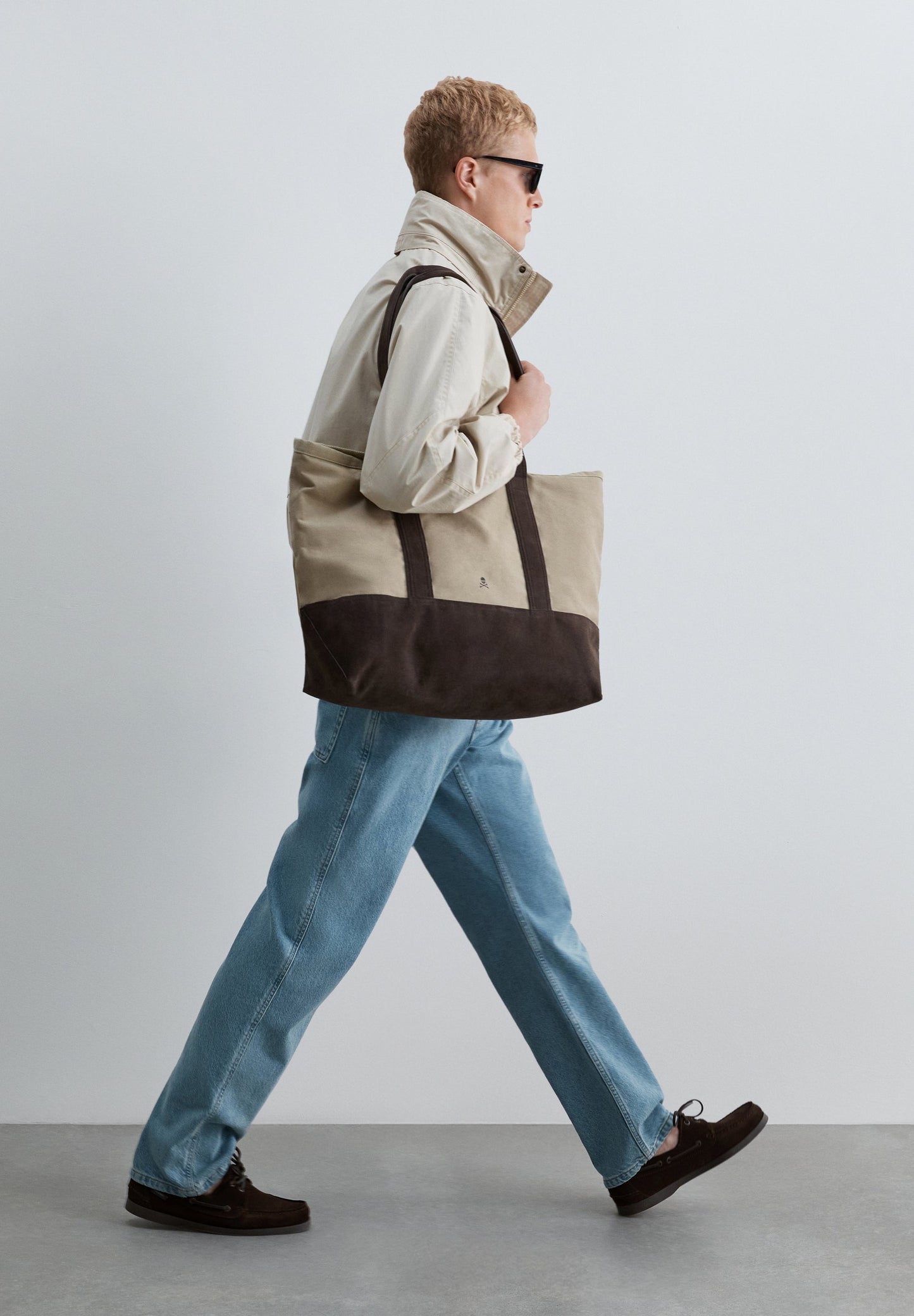 TECHNICAL JACKET WITH CONCEALED HOOD