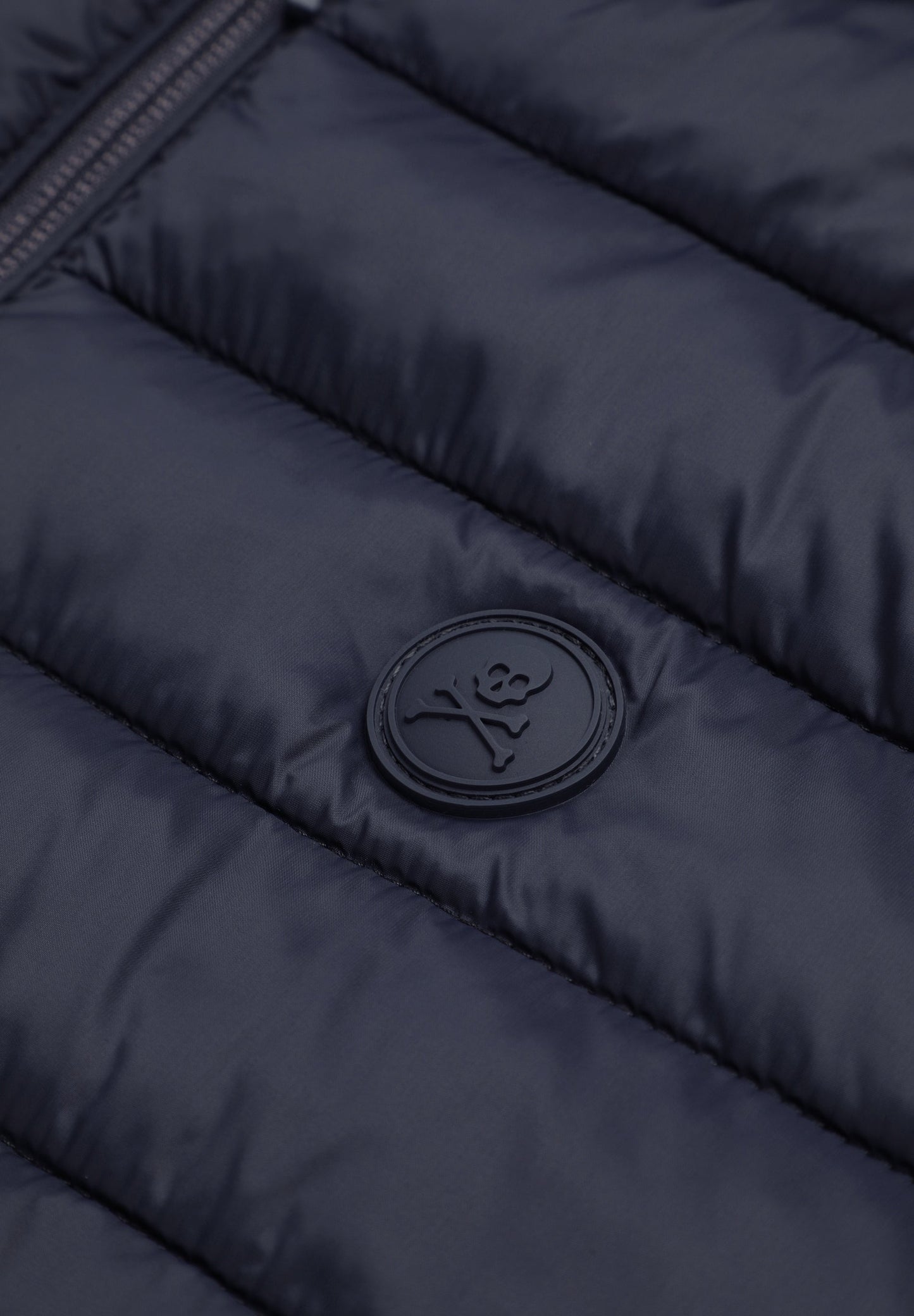 PUFFER JACKET WITH SKULL DETAIL