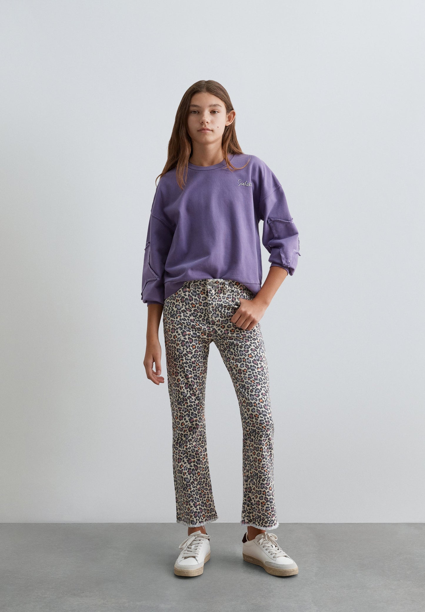 ANIMAL PRINT FLARED TROUSERS