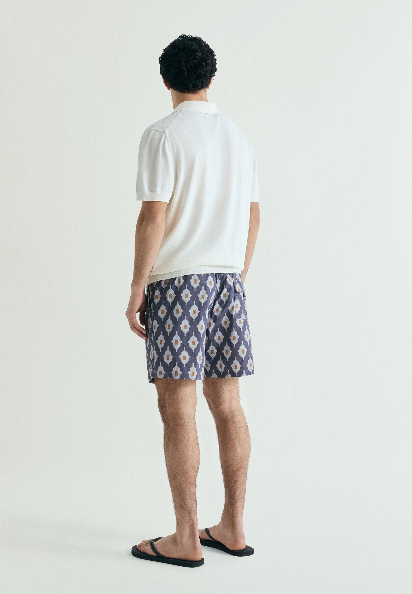 GEOMETRIC PRINT SWIMMING TRUNKS