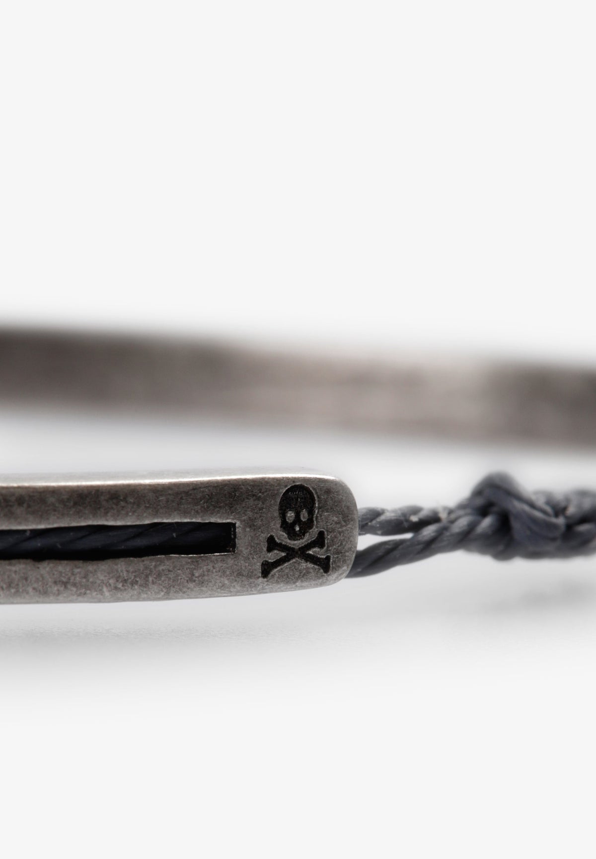 METAL AND CORD BRACELET