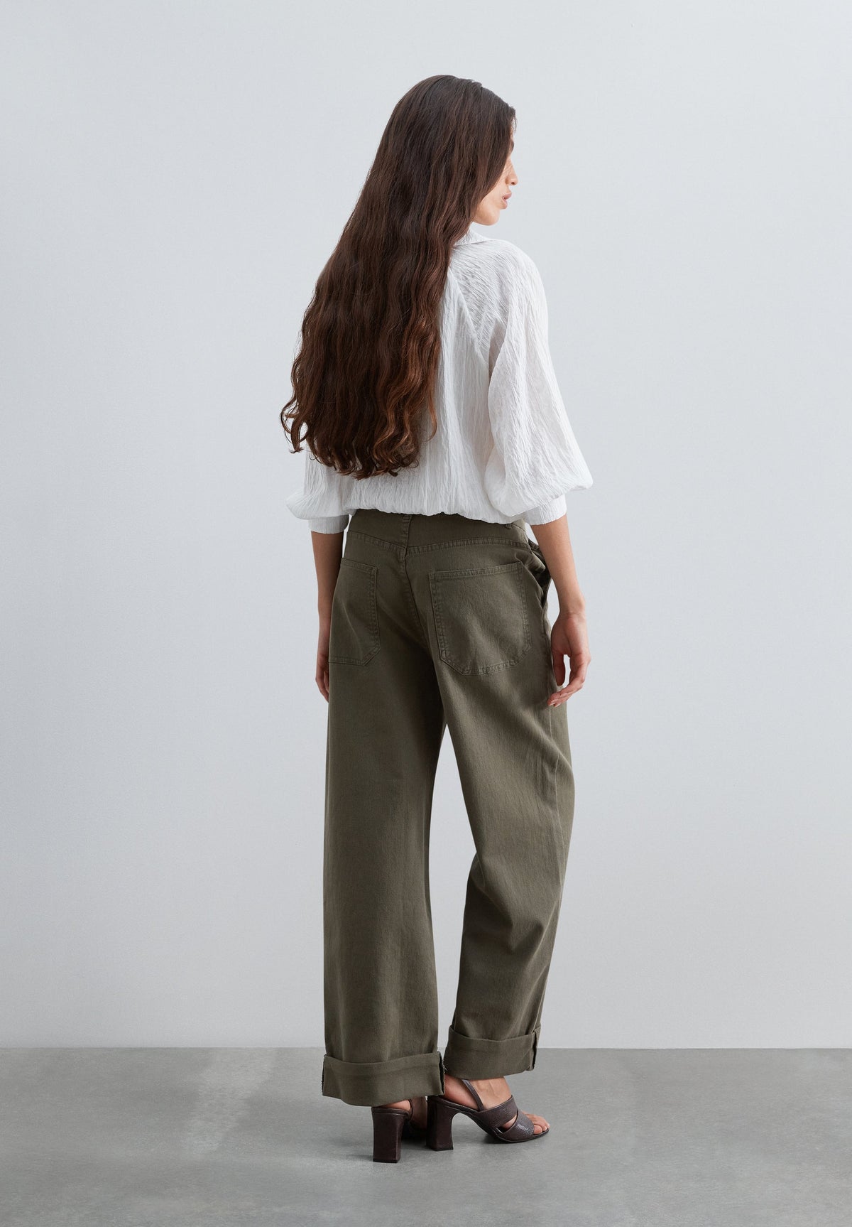 DENIM TROUSERS WITH HEM DETAIL