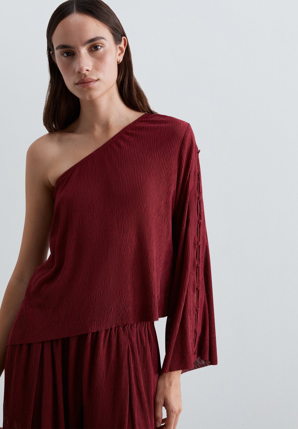 ASYMMETRIC TOP WITH CUT-OUTS