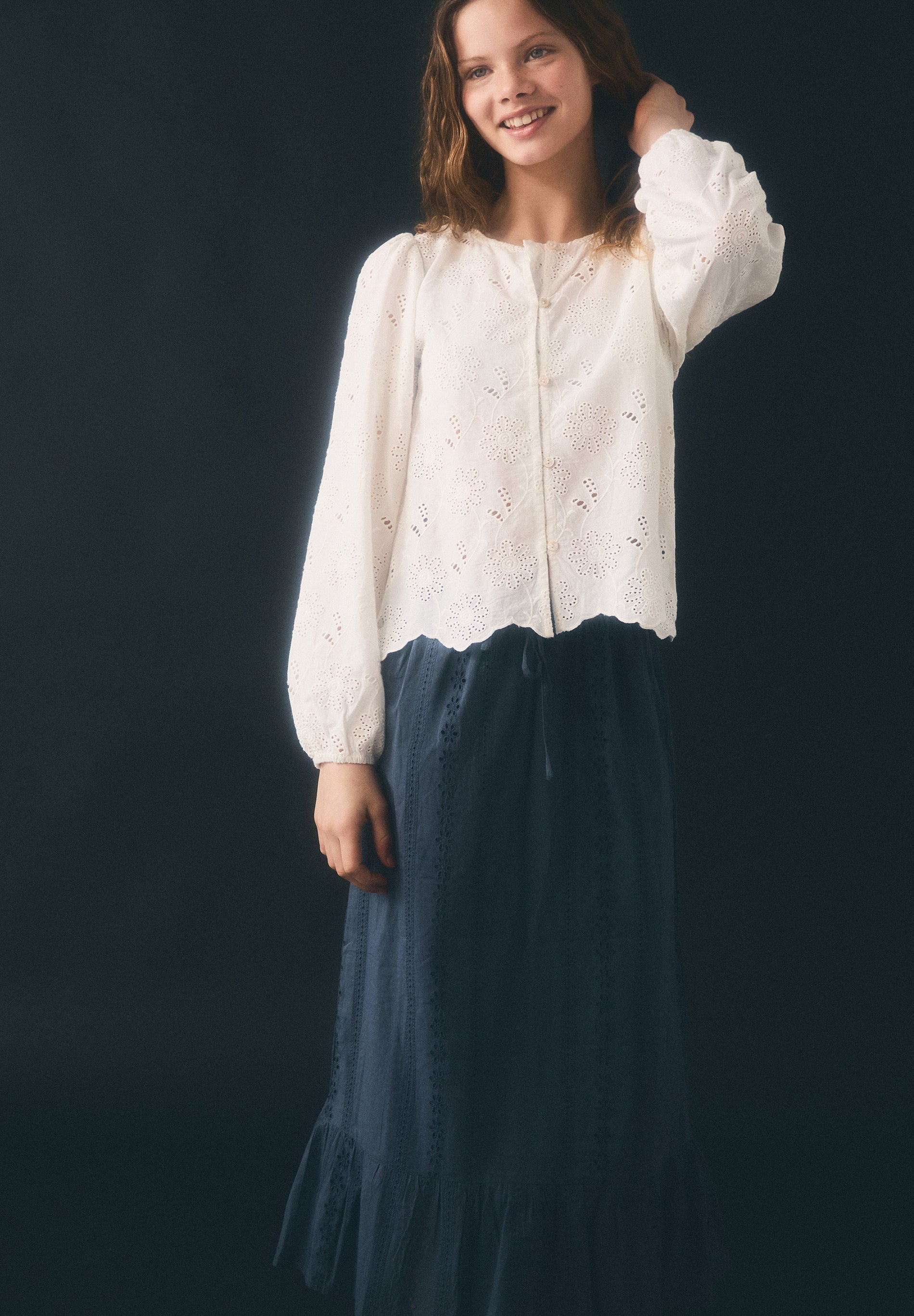 PERFORATED BLOUSE WITH BUTTONS