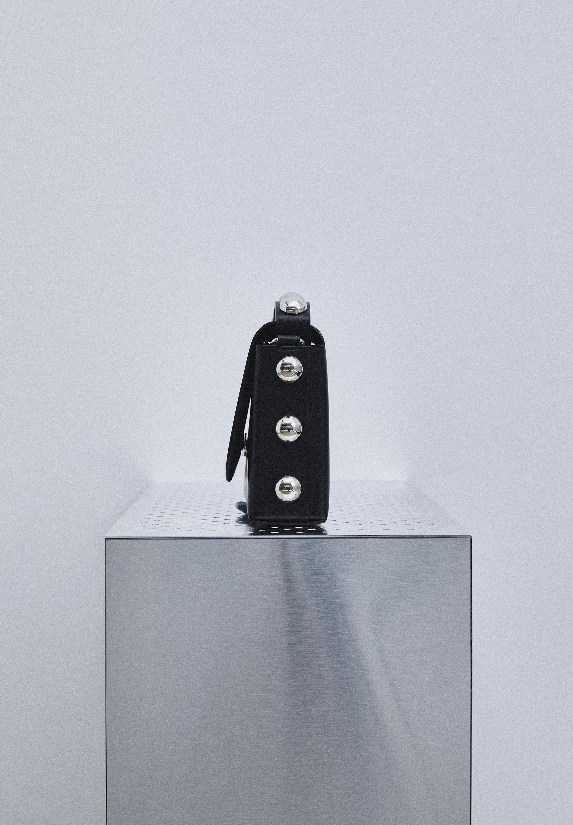 MINI BAG IN 100% LEATHER WITH STUDS