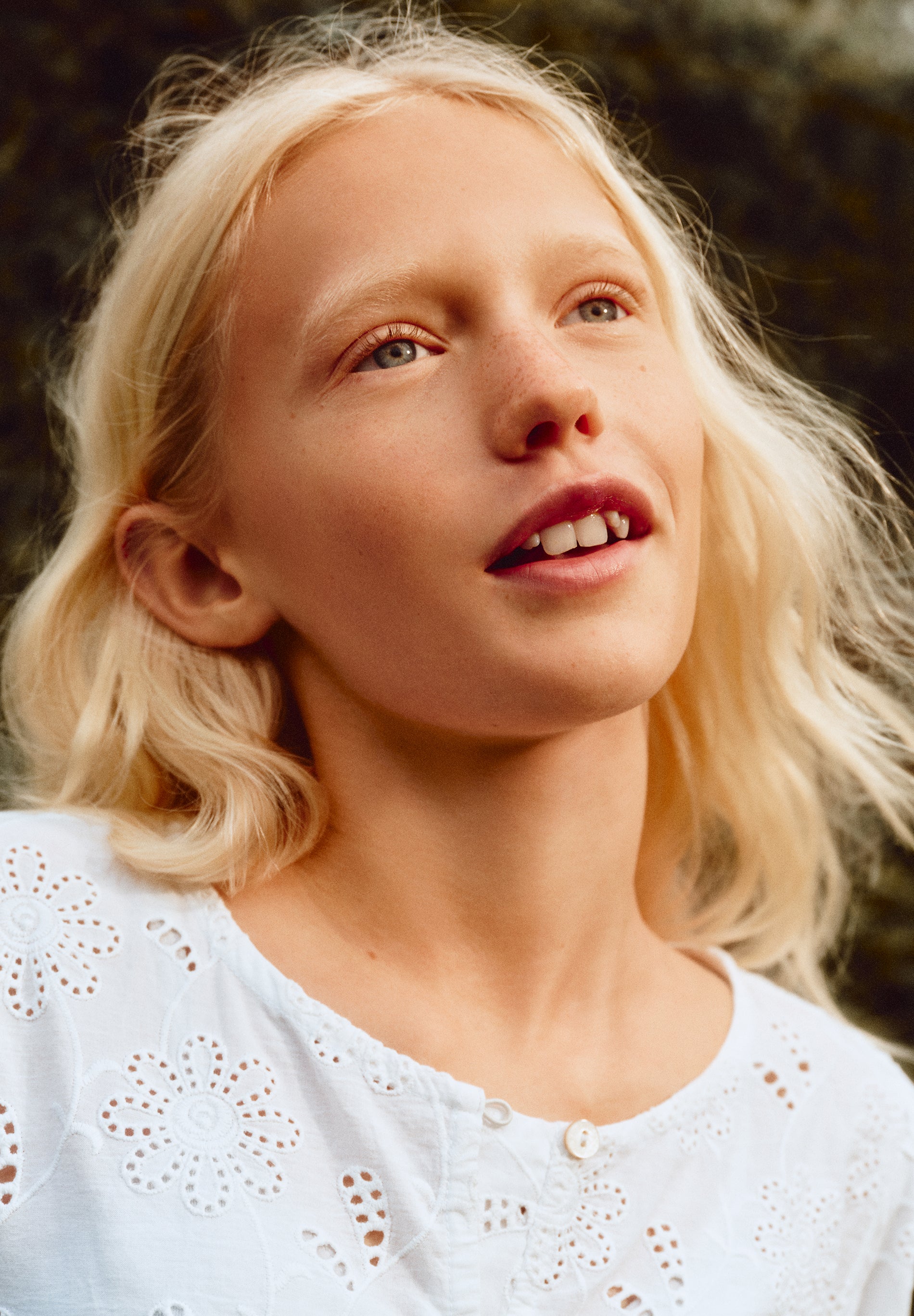 PERFORATED BLOUSE WITH BUTTONS