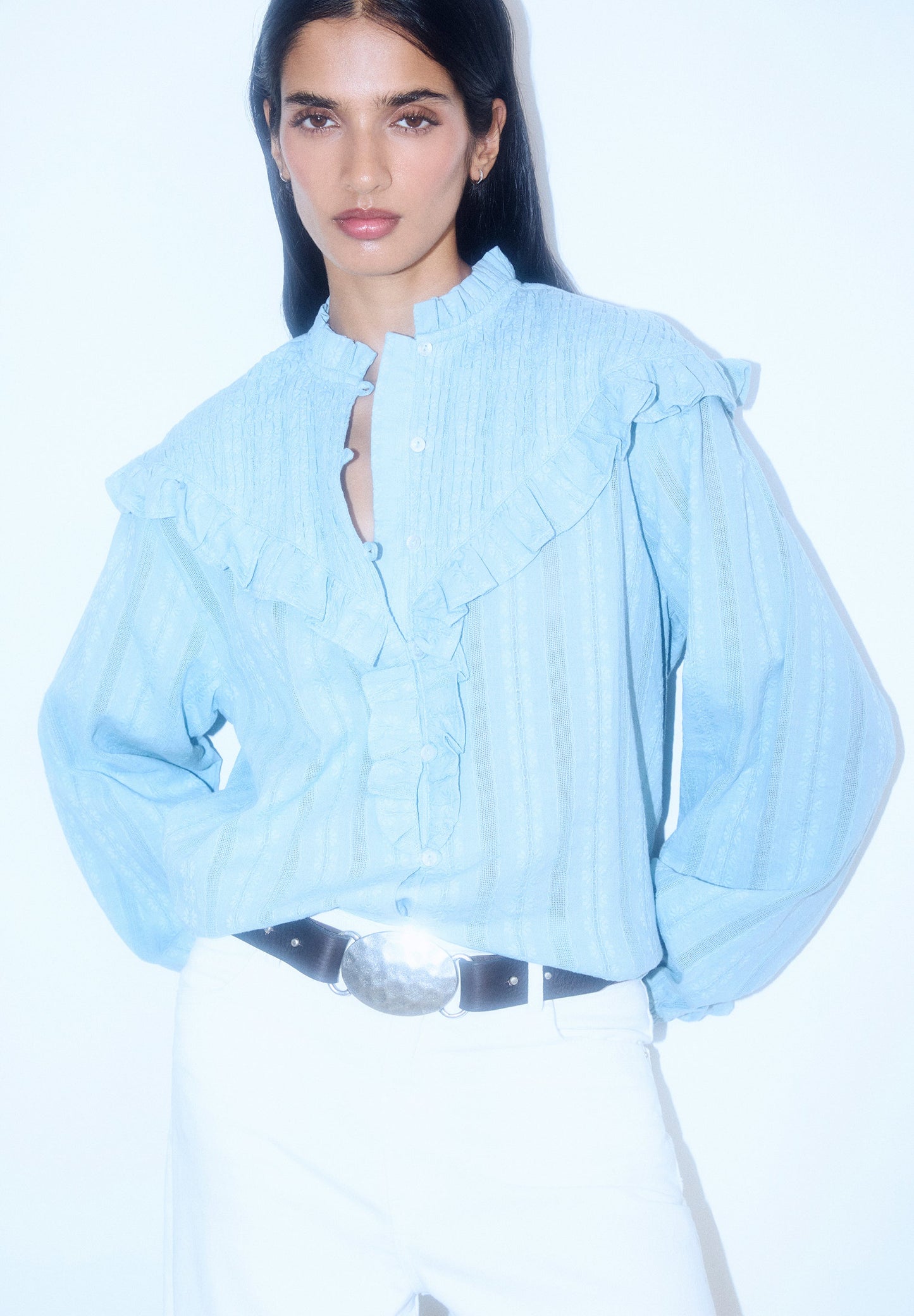 RUCHED BLOUSE WITH RUFFLES.