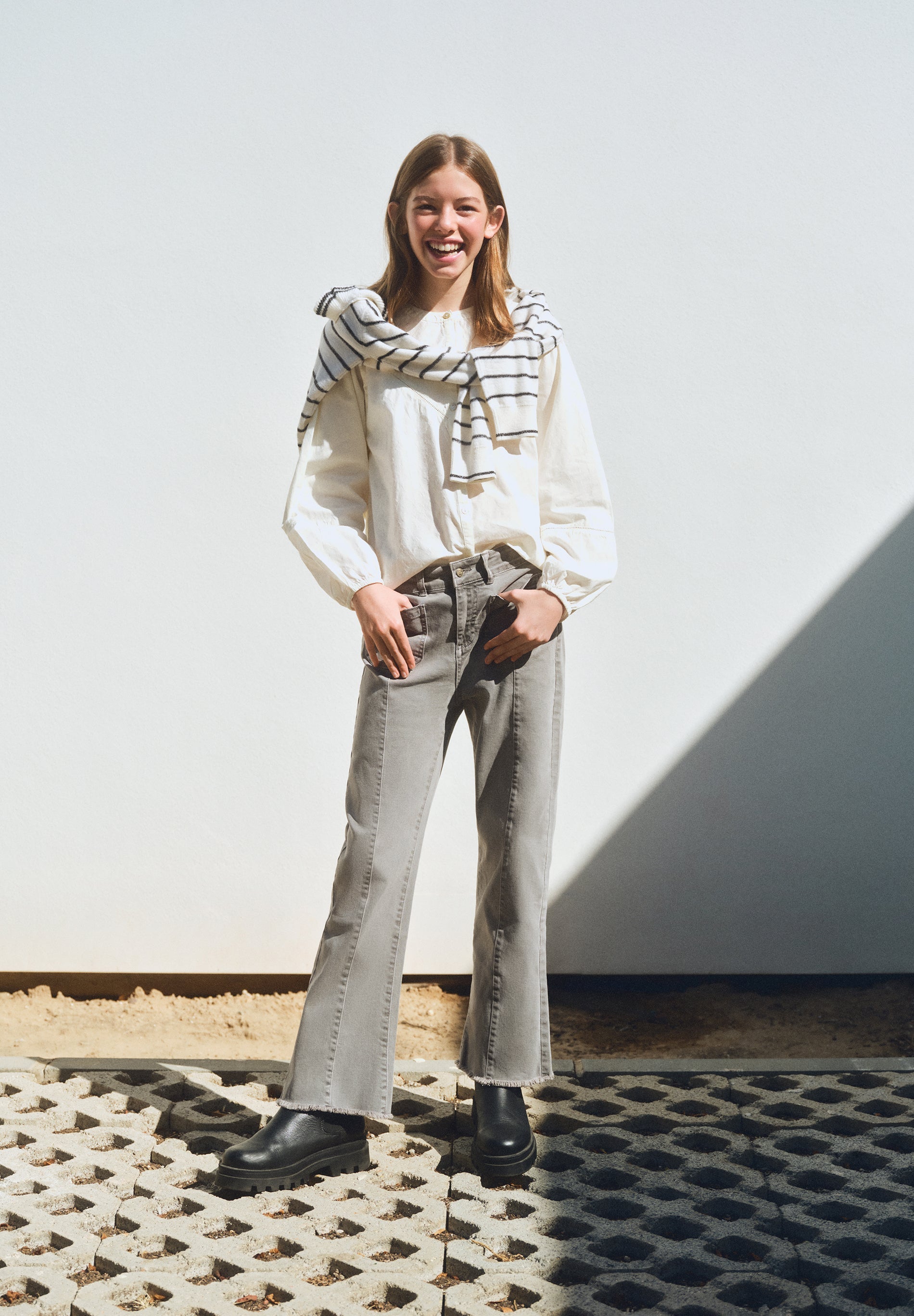 FLARED TROUSERS WITH FRINGING