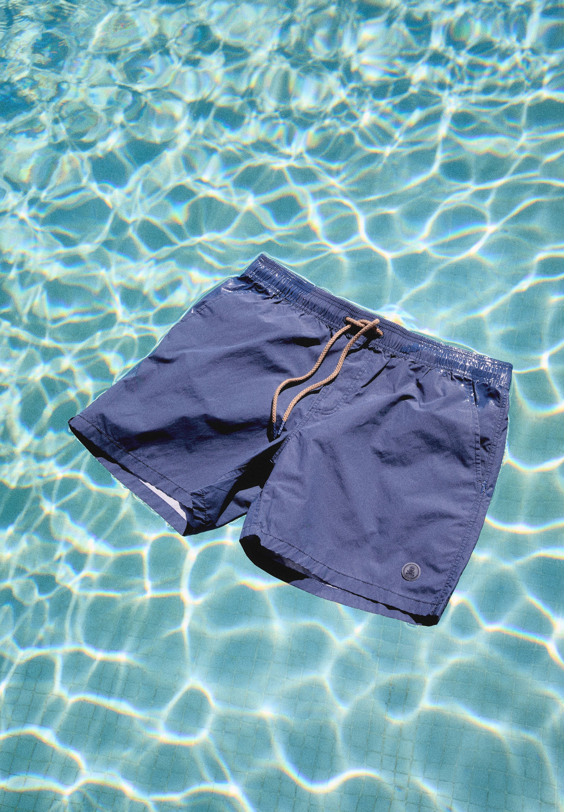 BASIC SWIMMING TRUNKS WITH POCKET